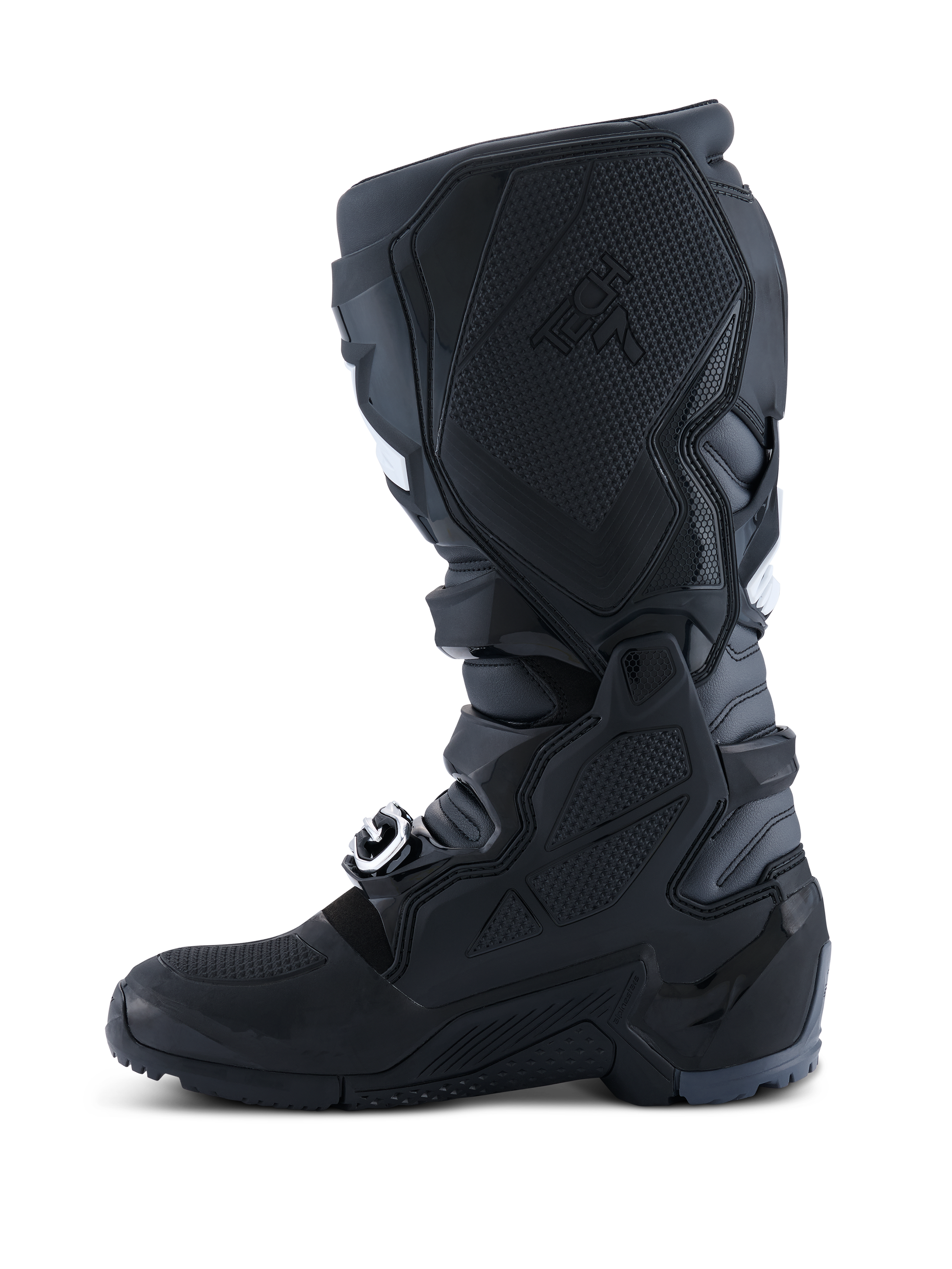 Botas Alpinestars 2026 Tech 7 Enduro, botas de motocross y enduro, Negro Antracita Blanco, vista lateral medial que muestra el panel de TPU texturizado para el contacto con la moto, suela robusta de doble compuesto y construcción de microfibra duradera.