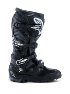 Botas Alpinestars Tech 7 Enduro 2026, negro antracita y blanco, botas de motocross especializadas con sistema de cierre de cuatro hebillas, parte superior de microfibra reforzada con PU y suela con tacos para terrenos de enduro, diseño estilizado con logo Tech 7 en el talón