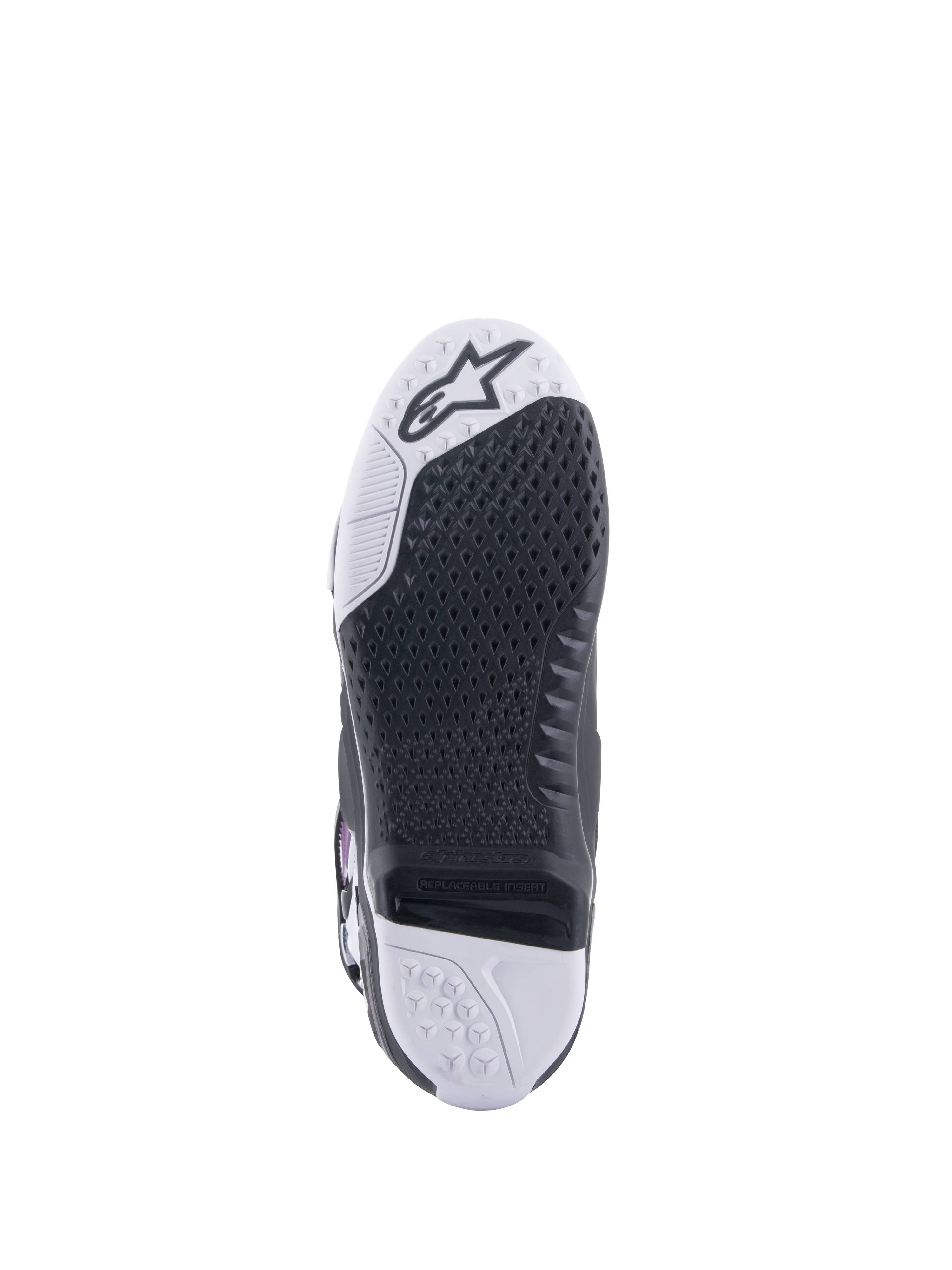 Alpinestars Tech 10 Supervented Boots, Motocross Boots, bottom sole view, black honeycomb grip pattern on white and black base, replaceable central insert, featuring the Alpinestars logo on the toe