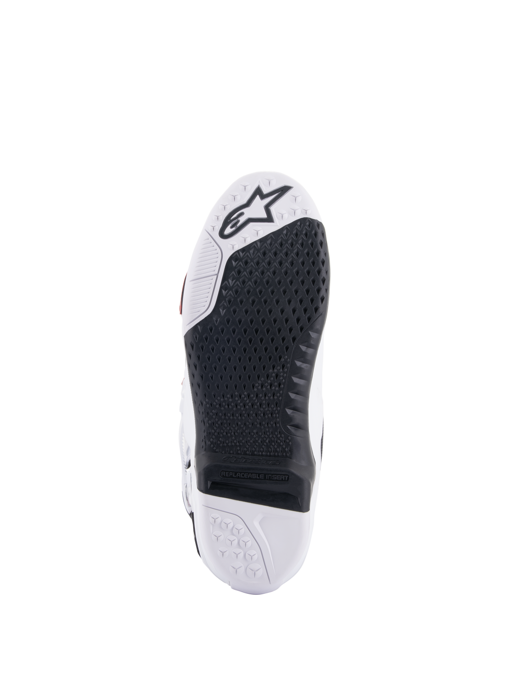 Botas Alpinestars Tech 10 Supervented, vista de la suela blanca y negra, con un diseño de agarre de panal extendido, inserción central reemplazable negra, puntera blanca con el logotipo de la estrella de Alpinestars, optimizada para el control en los estribos de motocross.