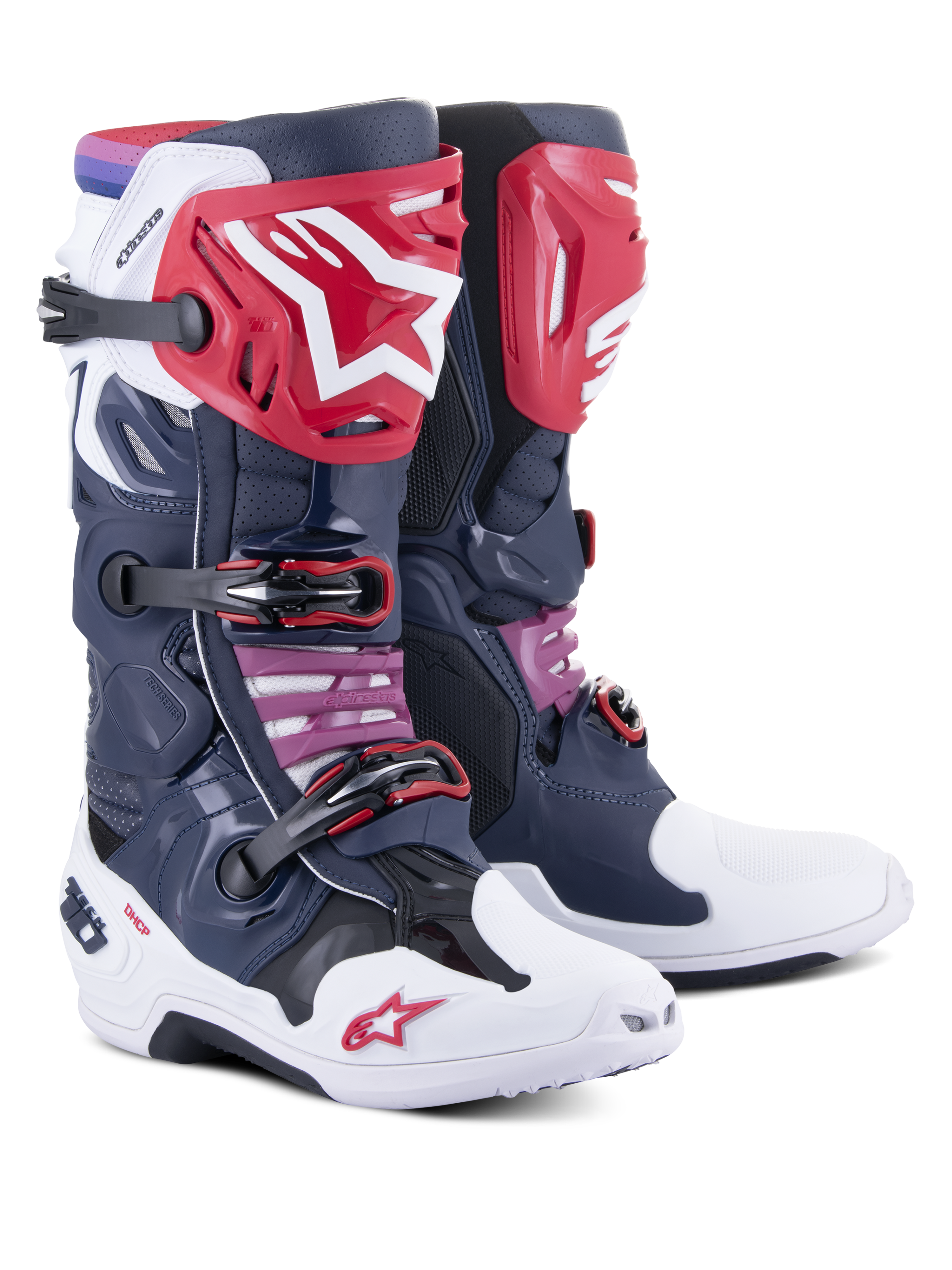 Botas Alpinestars Tech 10 Supervented, botas de motocross, color Night Navy White Rainbow, con espinilleras rojas con el logo de la estrella en blanco, múltiples hebillas negras y paneles de malla perforada para un alto flujo de aire