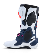 Alpinestars Tech-10 Supervented, botas de motocross en azul oscuro y blanco con detalles fucsia y carcasa ventilada.
