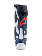 Alpinestars Tech-10 Supervented, botas de motocross en azul y blanco con fucsia, construcción de TPU perforado.
