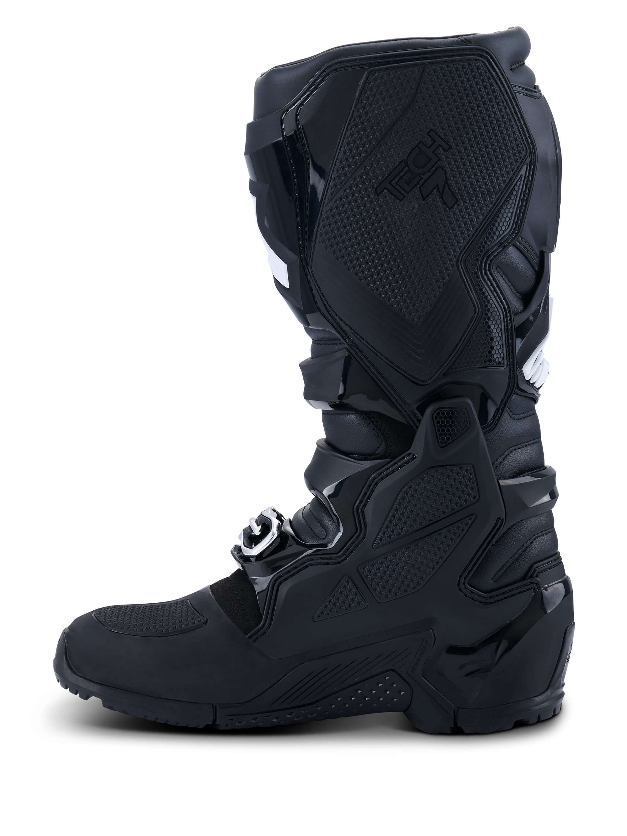 Botas Alpinestars 2026 Tech 7 Enduro Drystar®, negro, vista de perfil del lado medial con amplia protección de TPU, sistema de doble pivote y paneles de agarre texturizados para control de la moto, construcción impermeable para carreras de enduro y todoterreno