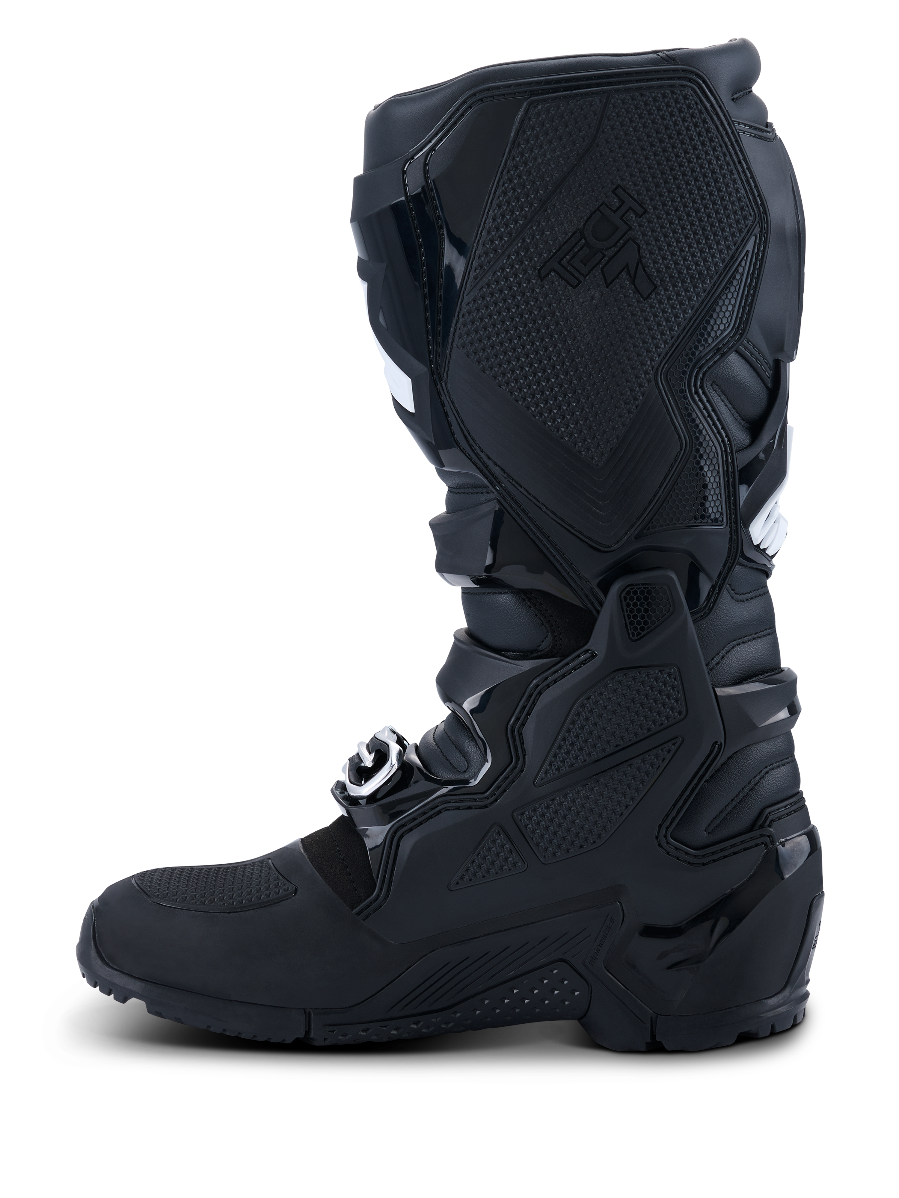 Botas Alpinestars 2026 Tech 7 Enduro Drystar®, negro, vista de perfil del lado medial con amplia protección de TPU, sistema de doble pivote y paneles de agarre texturizados para control de la moto, construcción impermeable para carreras de enduro y todoterreno