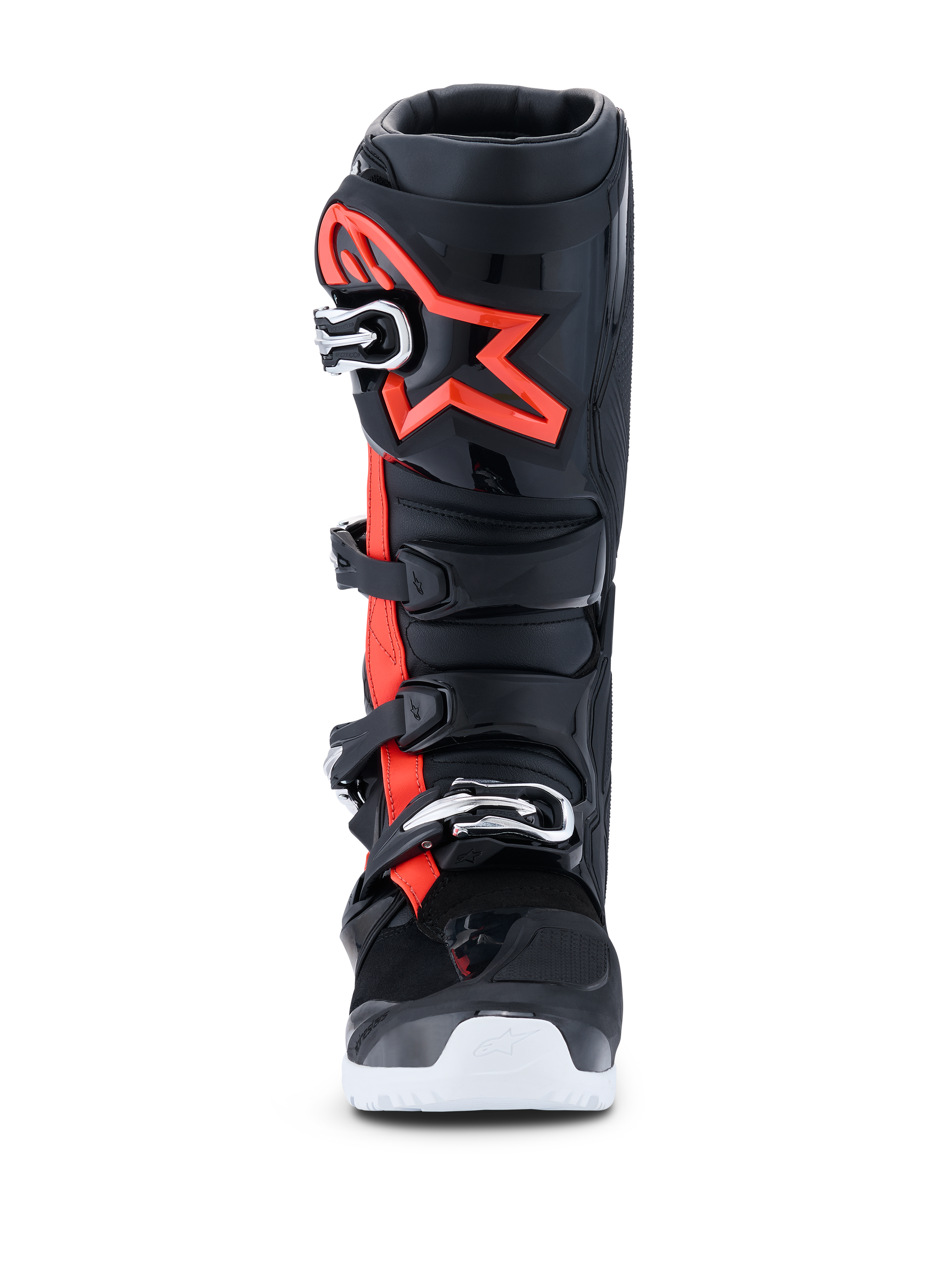 Botas Alpinestars 2026 Tech 7 Enduro Drystar®, botas de motocross y enduro, negro, rojo flúor y blanco, vista frontal, con un sistema de cierre de cuatro hebillas, espinillera de TPU reforzada con un gran logotipo rojo de Alpinestars y suela blanca, diseñadas para un rendimiento impermeable off-road.