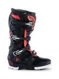 Botas Alpinestars 2026 Tech 7 Enduro Drystar®, calzado de motocross y enduro, negro, rojo flúor y blanco, perfil lateral que muestra cuatro hebillas plateadas y negras, carcasa reforzada de TPU y suela robusta blanca y negra específica para enduro, con marca Drystar y logo Tech 7