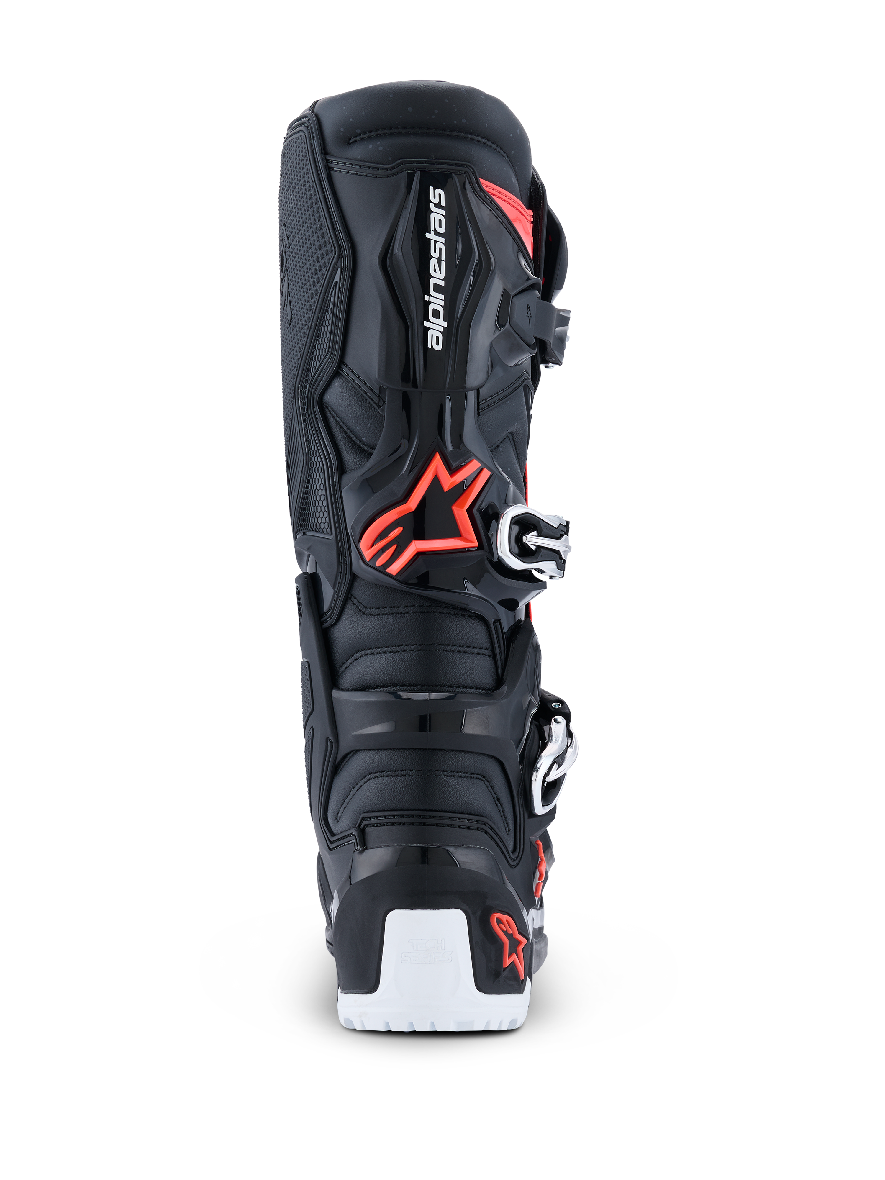 Botas Alpinestars 2026 Tech 7 Enduro Drystar®, botas de motocross enduro, negro, rojo flúor y blanco, vista trasera que destaca la carcasa protectora de TPU, el logotipo de Alpinestars, la zona de pivote biomecánico y el refuerzo blanco de la suela inferior.