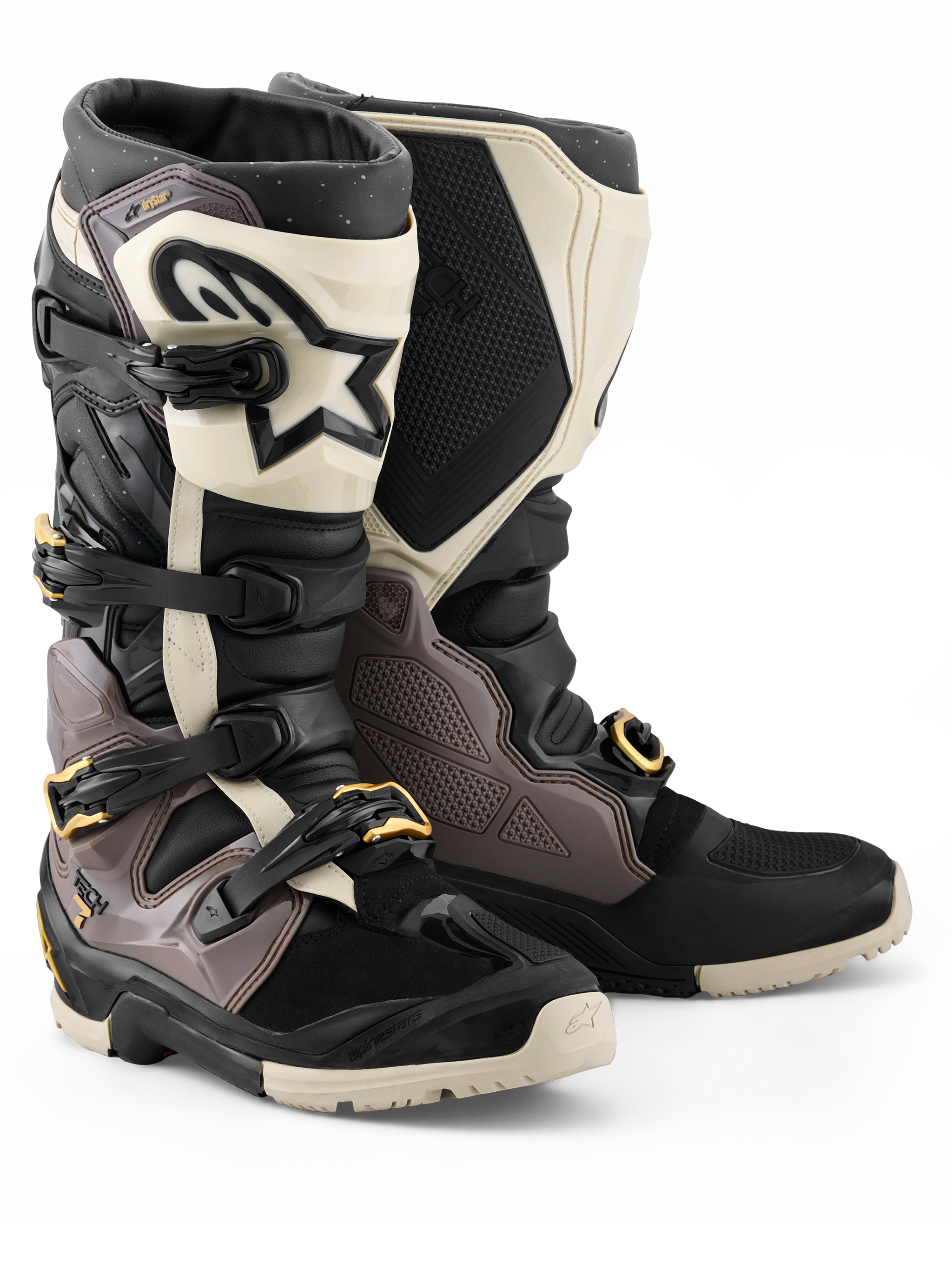 Alpinestars 2026 Tech 7 Enduro Drystar® Boots, Motocross and Enduro Boots, Black Dark Gray and Gold, featuring a rugged TPU shell, quick-release aluminum buckles with gold accents, and a large white shin plate with a black logo, designed for off-road durability.