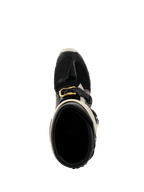 Botas Alpinestars Tech 7 Enduro Drystar® 2026, negro, gris oscuro y dorado, vista superior hacia el interior de la bota, con detalle de hebilla dorada, forro interno y puntera protectora de TPU.