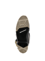 Alpinestars 2026 Tech 7 Enduro Drystar® Boots, bottom view showing the dual-compound sole, tan and black specialized tread patterns for maximum grip, featuring white Alpinestars logo and red wear limit indicator.
