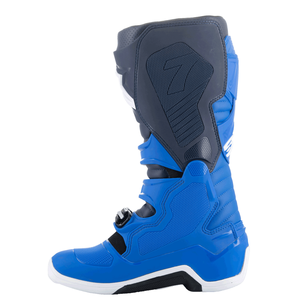 Botas Alpinestars Tech 7, botas de motocross, Alpine Blue, Night Navy y Bright Red, vista lateral interna que muestra los paneles protectores de TPU y la construcción reforzada para carreras todoterreno