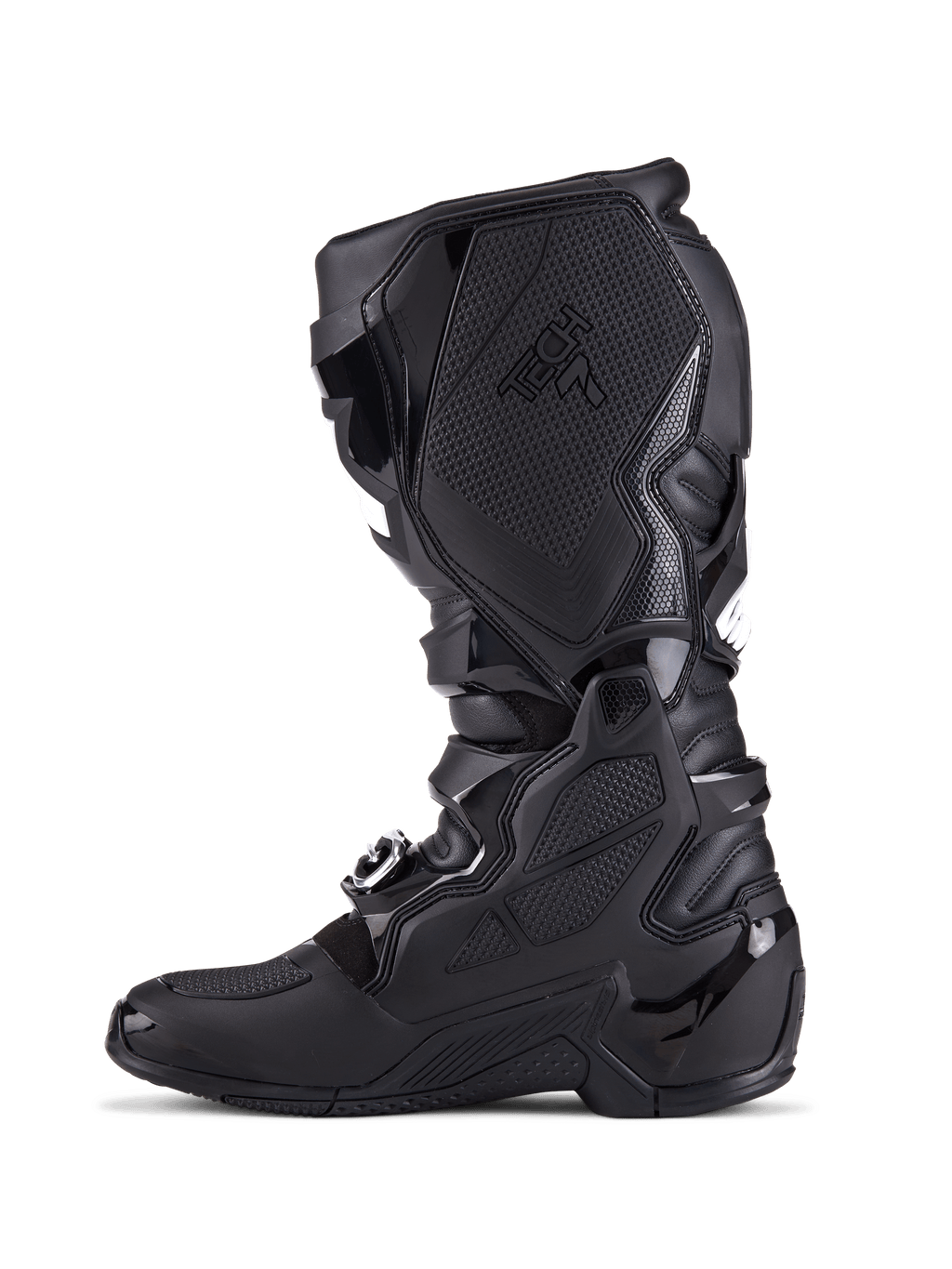 Botas Alpinestars Tech 7, botas de motocross, completamente negras, vista de perfil lateral con placas de protección de TPU, sistema de cierre de hebillas y paneles de agarre texturizados, calzado profesional para conducción off-road