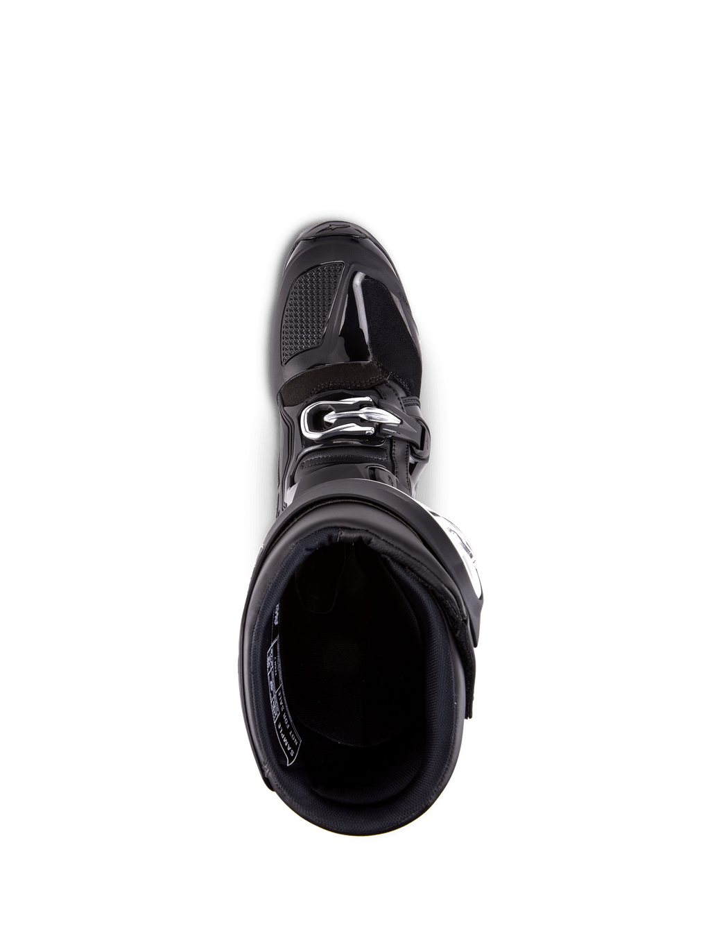 Botas Alpinestars Tech 7, botas de motocross, negras, vista cenital del forro interior, con cierre de hebilla plateada y puntera reforzada, calzado profesional para carreras off-road.