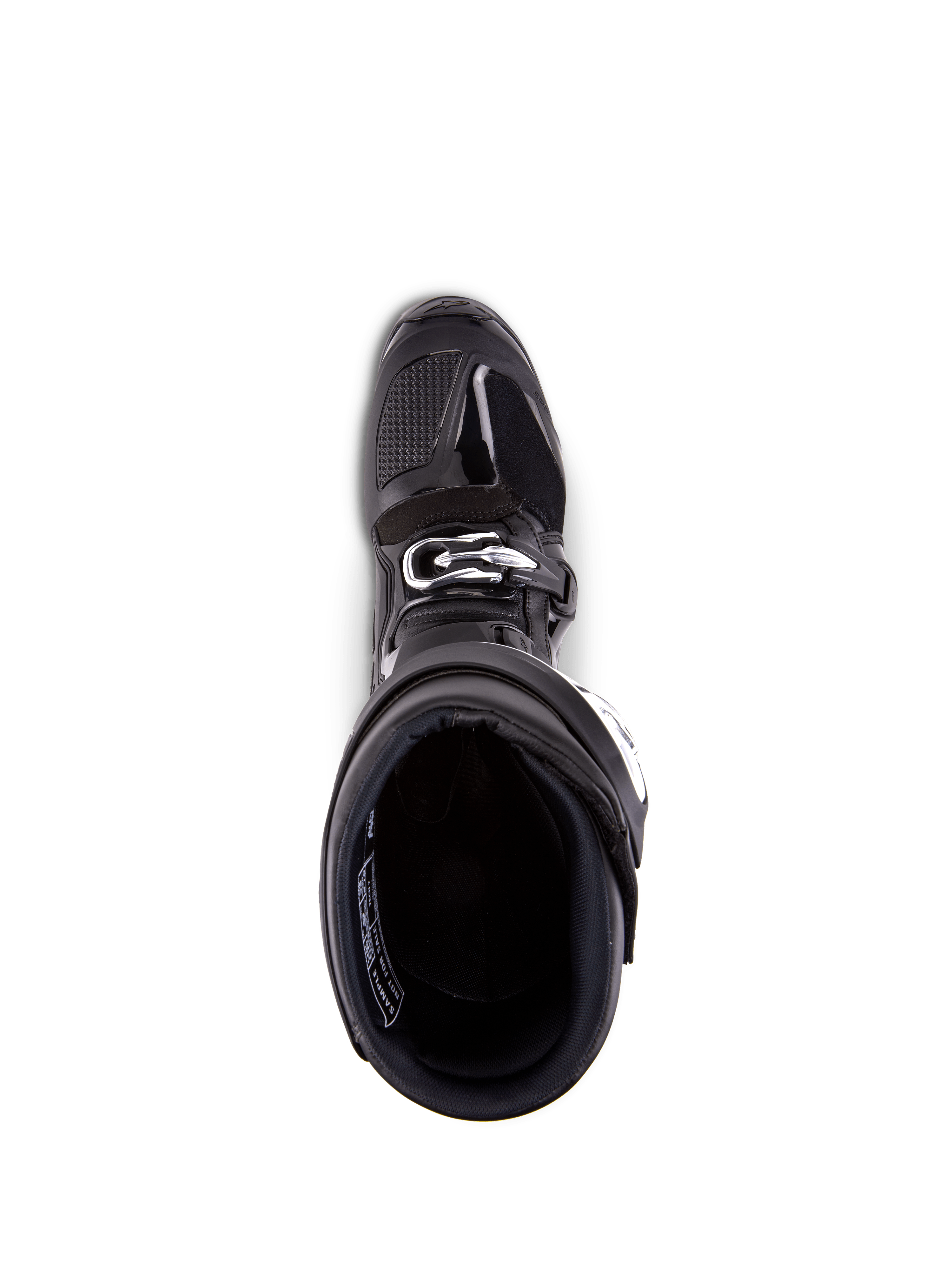 Botas Alpinestars Tech 7, botas de motocross, negras, vista cenital del forro interior, con cierre de hebilla plateada y puntera reforzada, calzado profesional para carreras off-road.