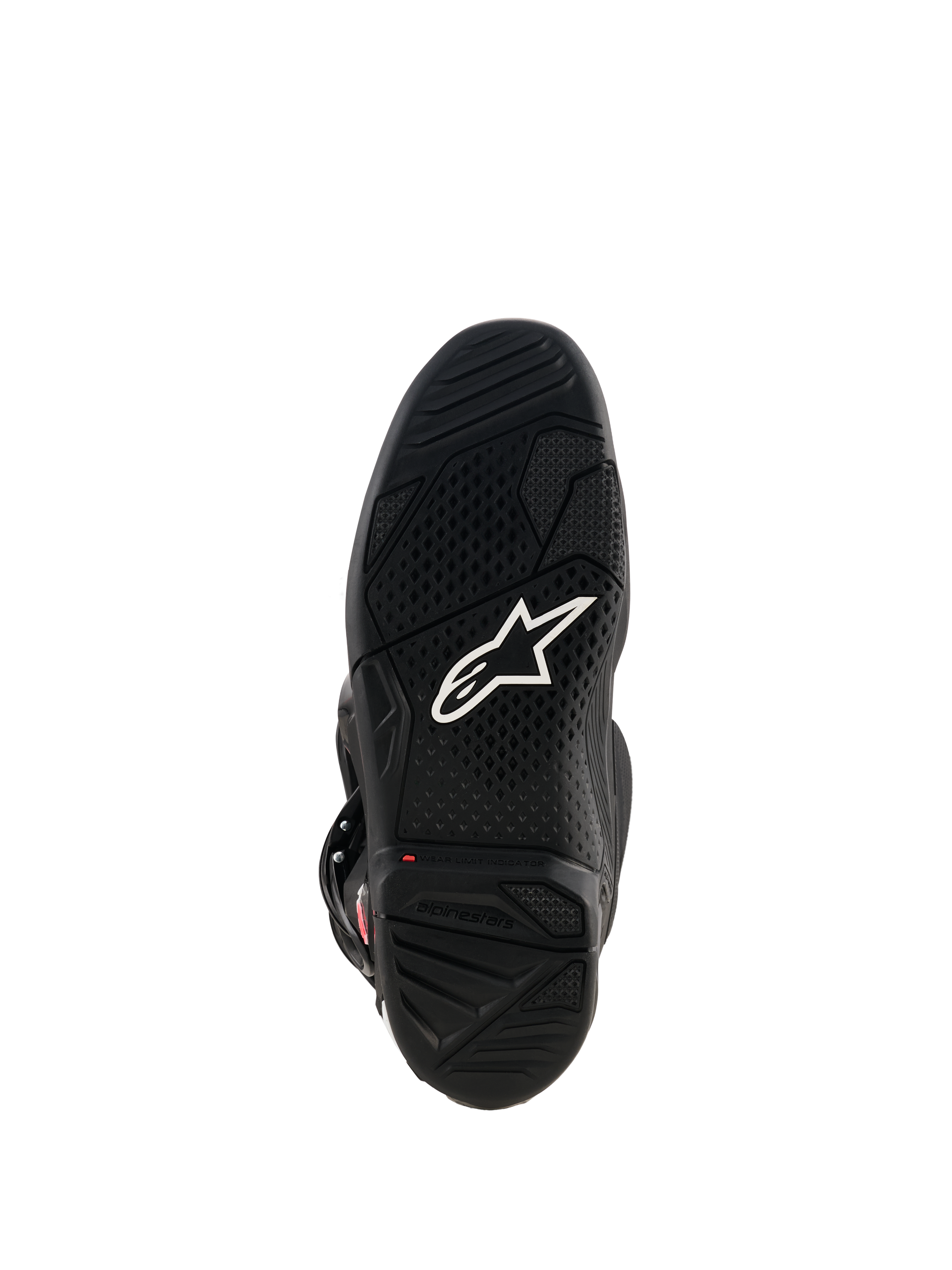Botas Alpinestars Tech 7, vista de la suela de goma negra, con logotipo Astar blanco, dibujo de la suela texturizado e indicador rojo de límite de desgaste para rendimiento en motocross