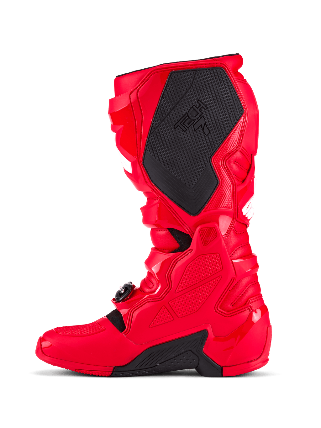 Botas Alpinestars Tech 7, botas de motocross, rojo brillante, vista lateral medial que presenta un gran panel de agarre negro texturizado con la marca Tech 7, carcasa protectora de TPU y sistema de cierre de hebilla ajustable para competición off-road