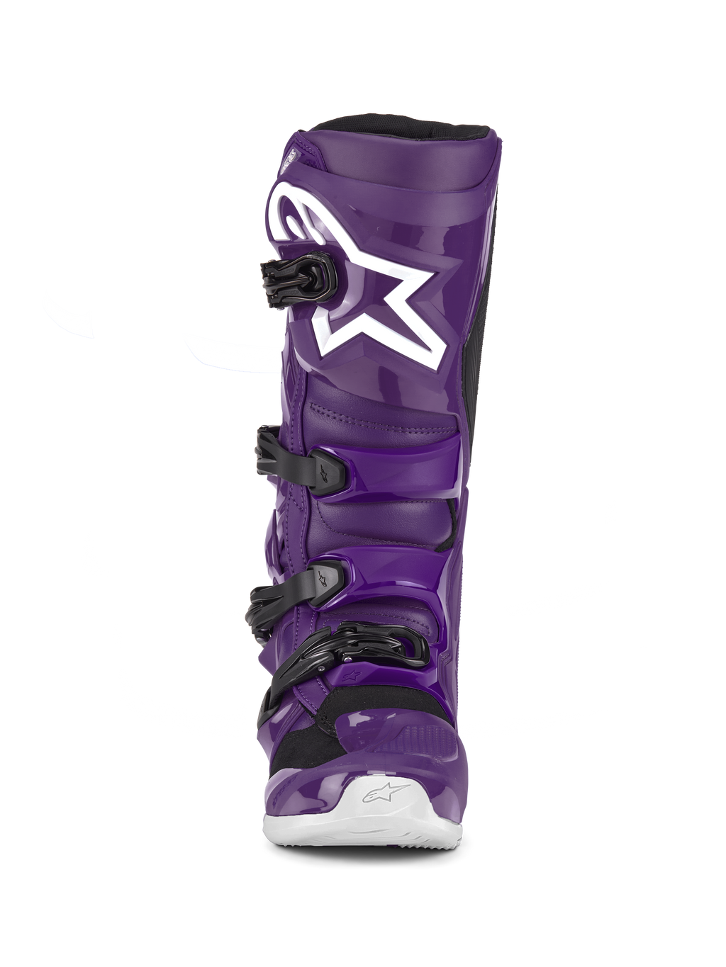Botas Alpinestars Tech 7, botas de motocross moradas, vista frontal, con cuatro hebillas negras, logo Alpinestars blanco en la placa de la espinilla, carcasa de TPU duradera y construcción sintética para protección off-road
