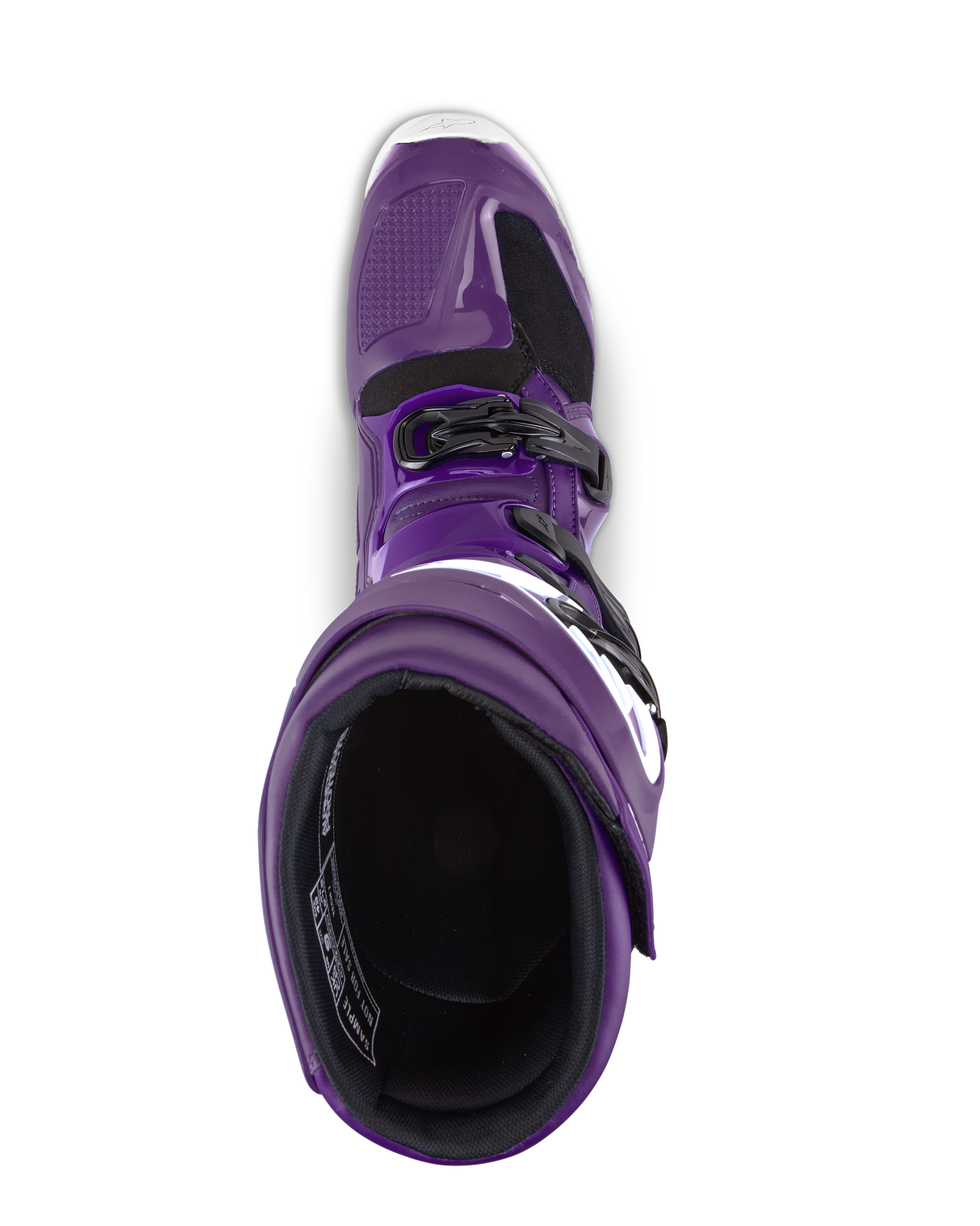 Botas Alpinestars Tech 7, botas de motocross, morado, vista superior mirando hacia la apertura de la bota, con hebillas negras y detalles blancos, construcción sintética duradera para carreras todoterreno