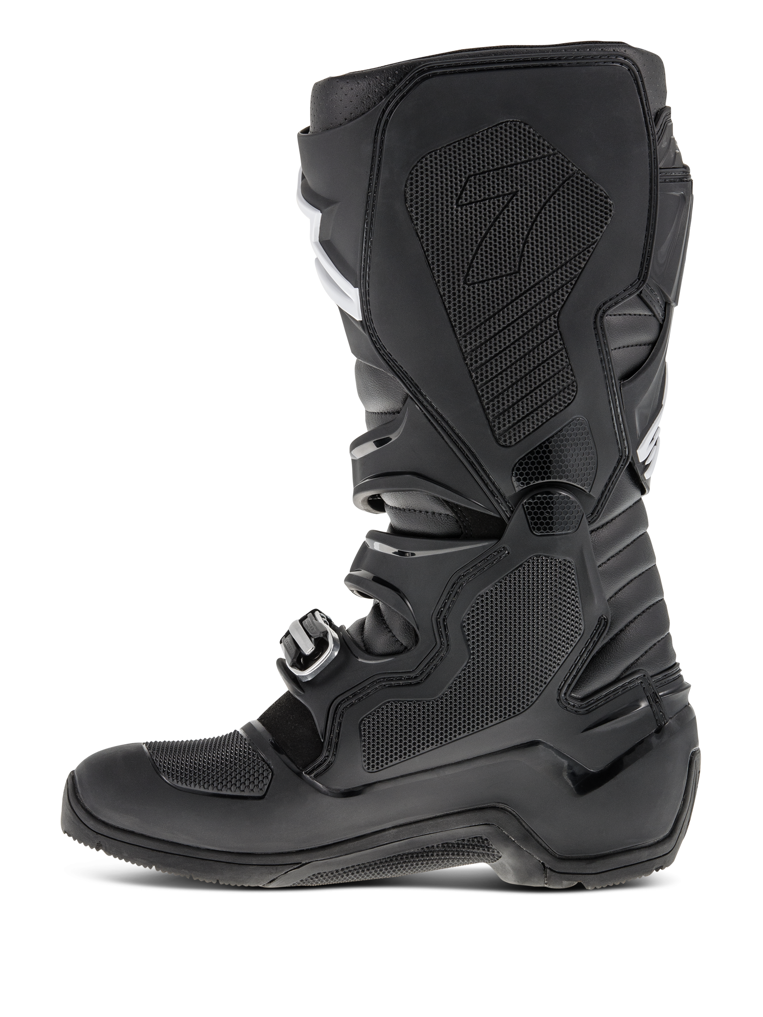 Botas Alpinestars Tech 7 Enduro, Negro, vista de perfil lateral que destaca el lado medial con inserción de goma de panal, paneles protectores de TPU y sistema de cierre de hebillas para rendimiento de motocross todoterreno.