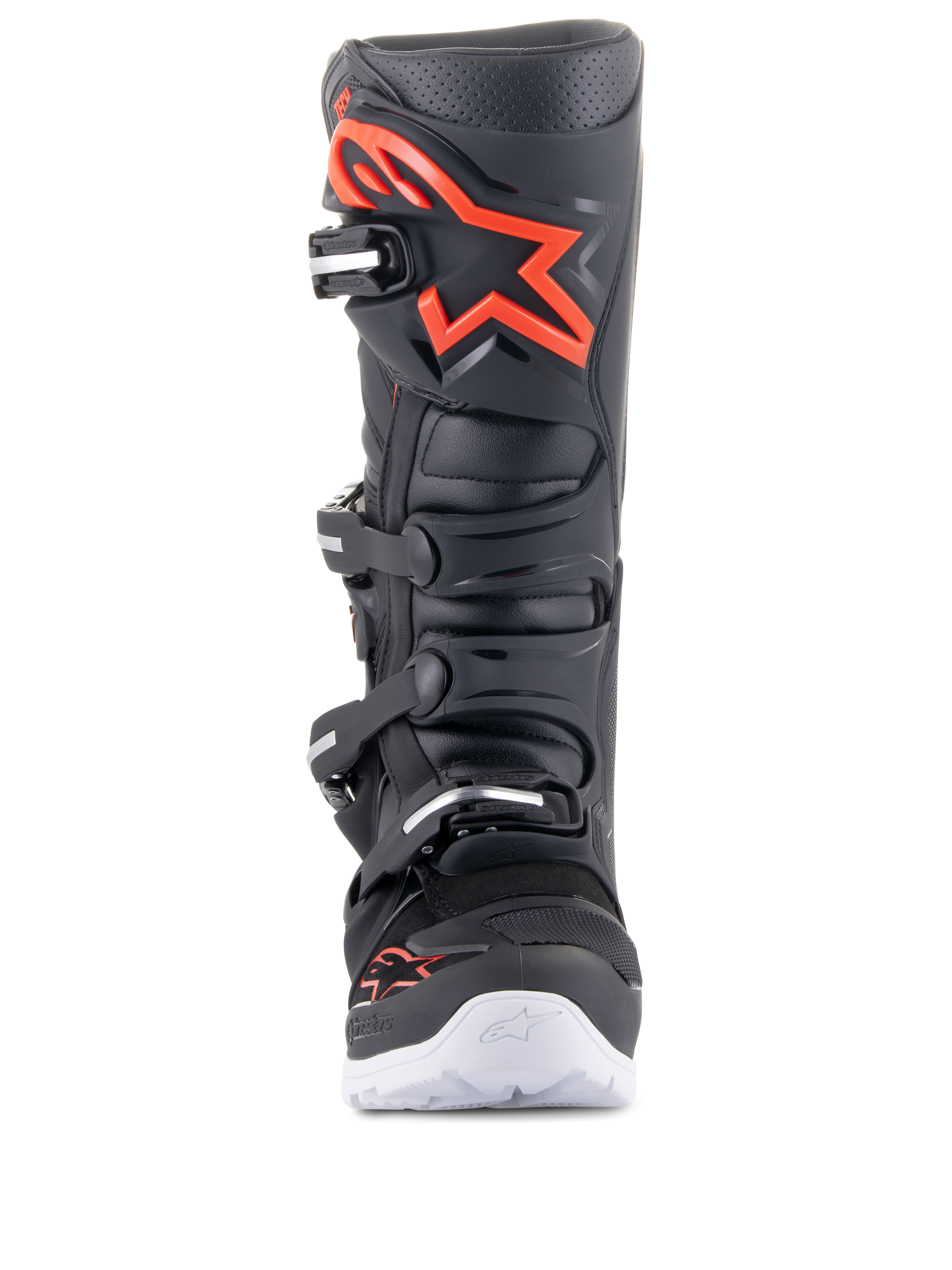 Botas Alpinestars Tech 7 Enduro, negro y rojo flúor, vista frontal, con un gran logotipo rojo en la espinillera, sistema de cierre de cuatro hebillas y detalles blancos en la suela, calzado profesional de motocross y todoterreno.