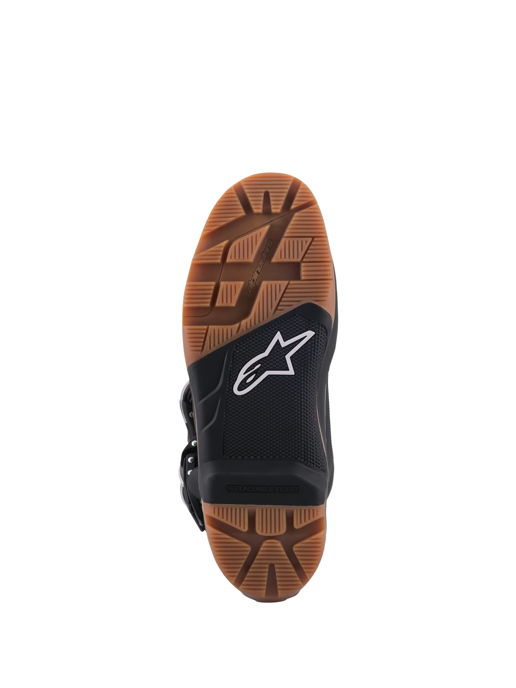 Botas Alpinestars Tech 7 Enduro, vista en primer plano de la suela, con patrón de dibujo de goma marrón y sección central negra con logotipo de estrella blanca, inserto de estribo reemplazable para un agarre superior off-road