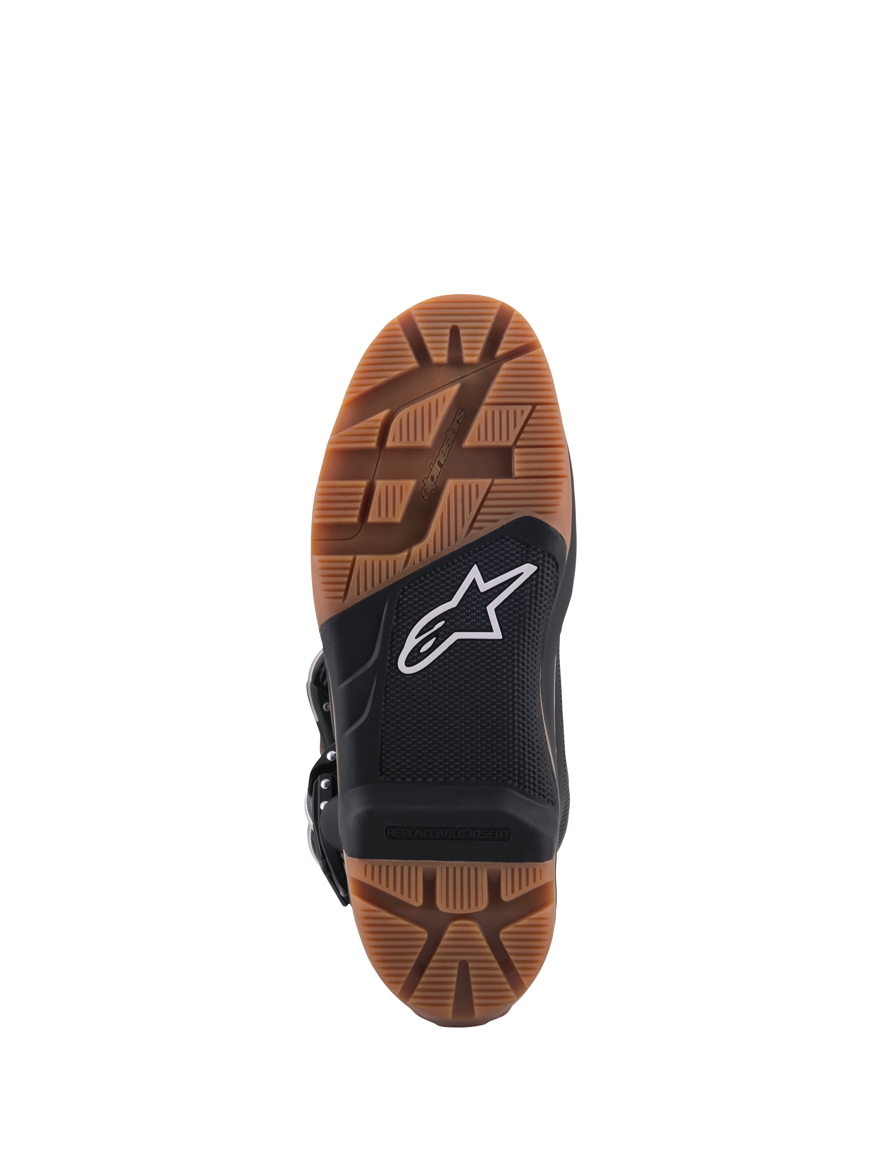 Botas Alpinestars Tech 7 Enduro, vista en primer plano de la suela, con patrón de dibujo de goma marrón y sección central negra con logotipo de estrella blanca, inserto de estribo reemplazable para un agarre superior off-road