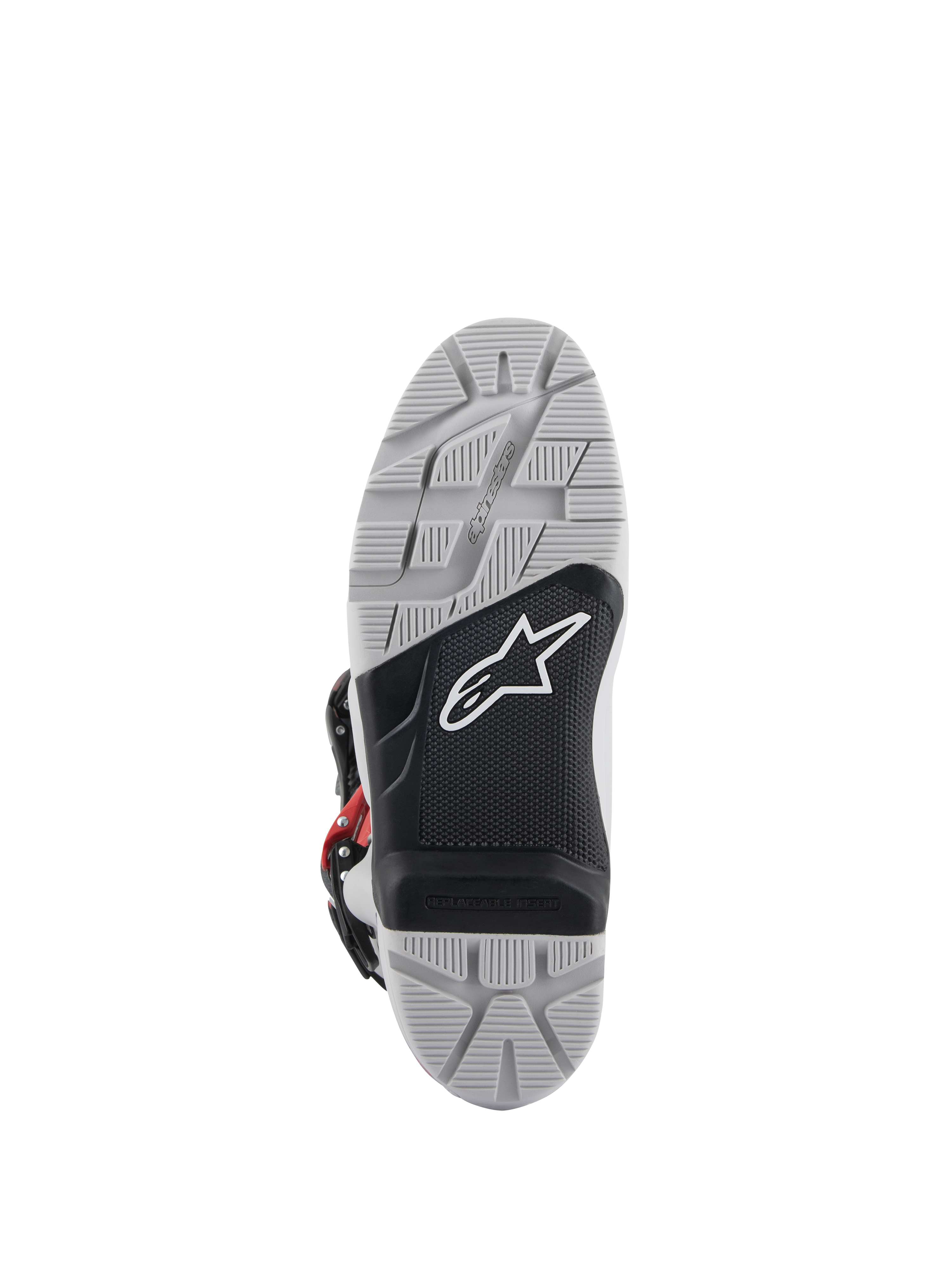 Botas Alpinestars Tech 7 Enduro, vista de la suela, suela de doble compuesto en gris y negro con logotipo de estrella blanca, banda de rodadura con textura profunda para un máximo agarre off-road, inserción de estribo reemplazable diseñada para durabilidad en conducción de enduro y todoterreno