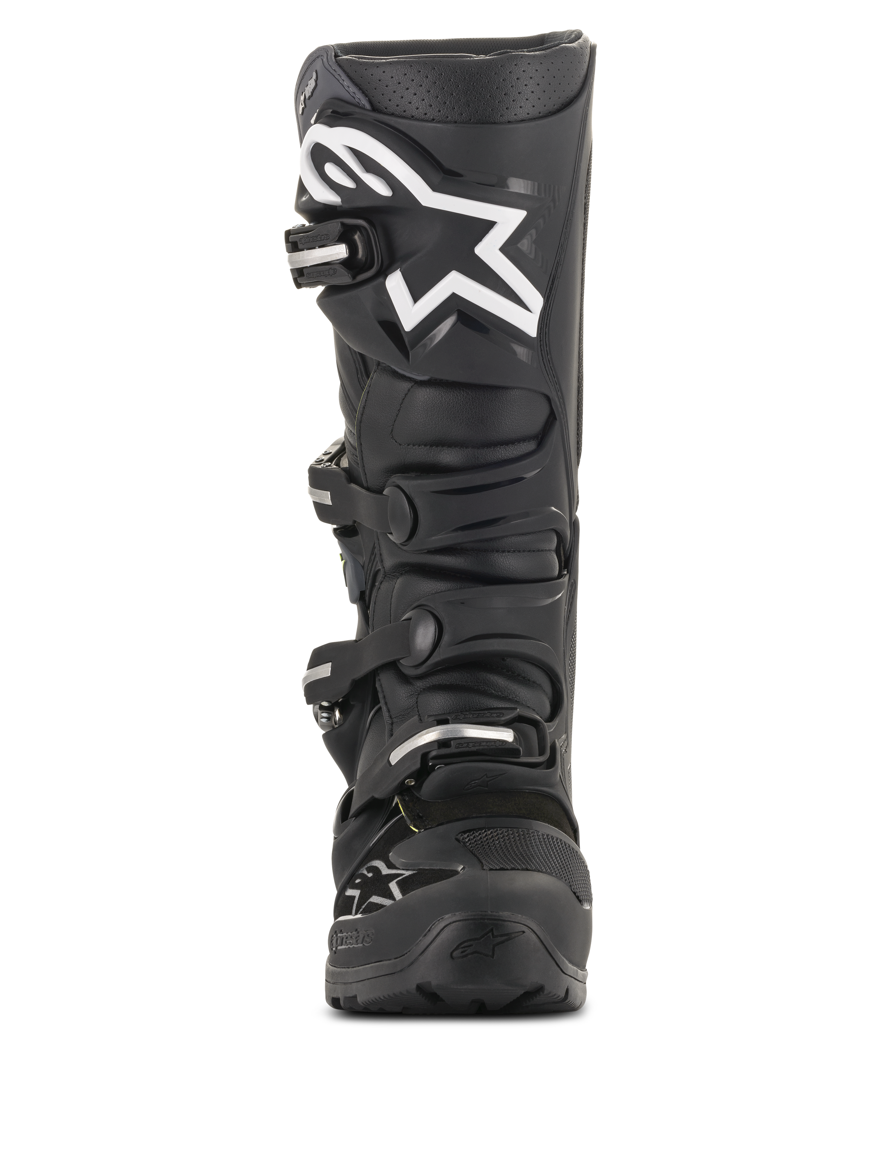 Botas Alpinestars Tech 7 Enduro Drystar®, botas de motocross negras, vista frontal con un gran logotipo de estrella blanca en la espinilla, sistema de cierre de cuatro hebillas, construcción duradera de TPU para conducción de enduro y todoterreno