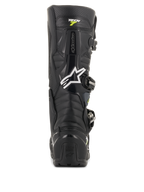 Botas Alpinestars Tech 7 Enduro Drystar, botas de motocross negras y grises, vista trasera con el logo de Alpinestars en blanco y marca 'Tech 7', protección de talón de TPU resistente y construcción reforzada para durabilidad todoterreno