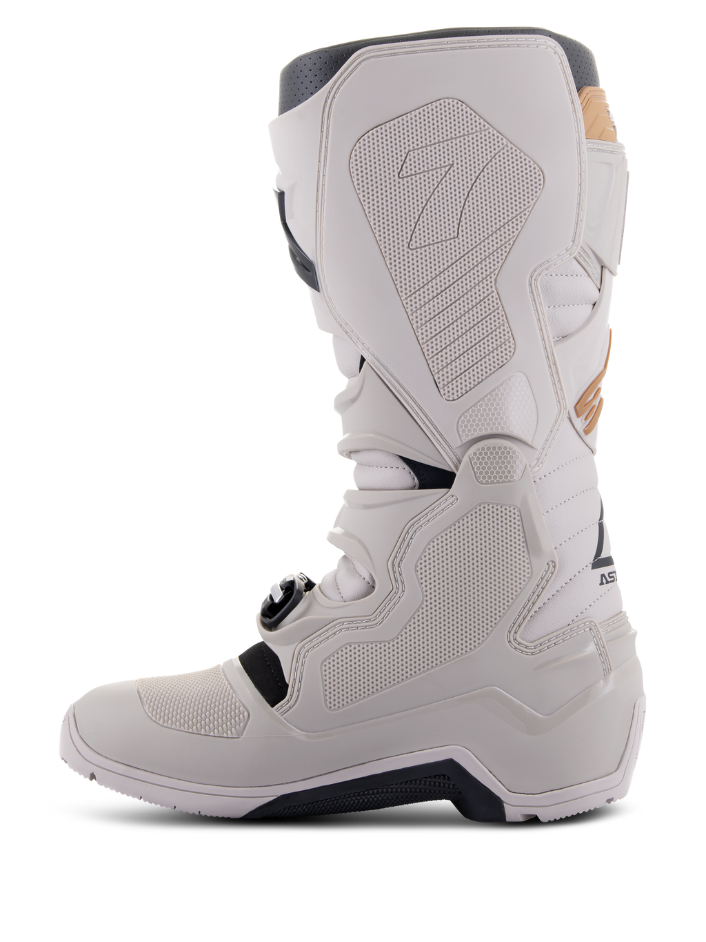 Botas Alpinestars Tech 7 Enduro Drystar® en color Gray Sand, vista lateral medial que muestra paneles de agarre con textura de panal, construcción en TPU gris claro y microfibra, suela negra y membrana impermeable para rendimiento todoterreno