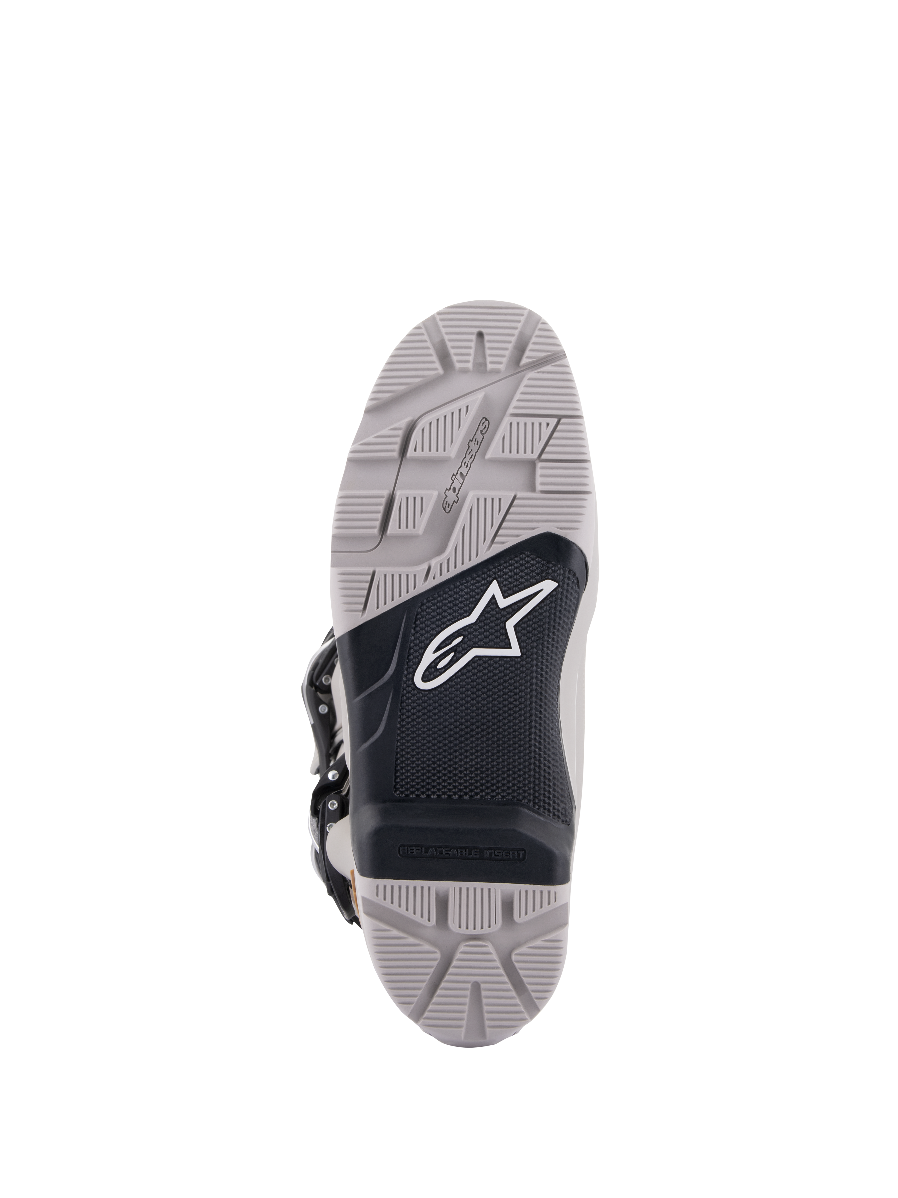 Botas Alpinestars Tech 7 Enduro Drystar®, vista de la suela, gris y negro, dibujo de alto agarre con un panel central negro texturizado, logotipo Astar blanco, cuenta con un inserto reemplazable para durabilidad y tracción en conducción de enduro