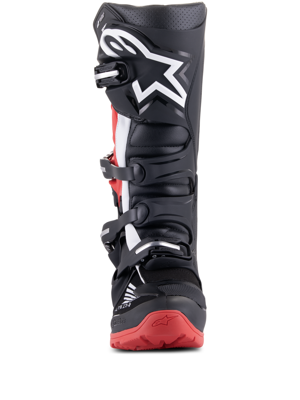 Botas Alpinestars Honda Tech 7 Enduro Drystar, negro y rojo brillante, vista frontal que muestra el sistema de cierre de múltiples hebillas, gran logotipo de estrella blanca en la espinilla y suela roja con la marca Honda, botas de moto impermeables para todoterreno
