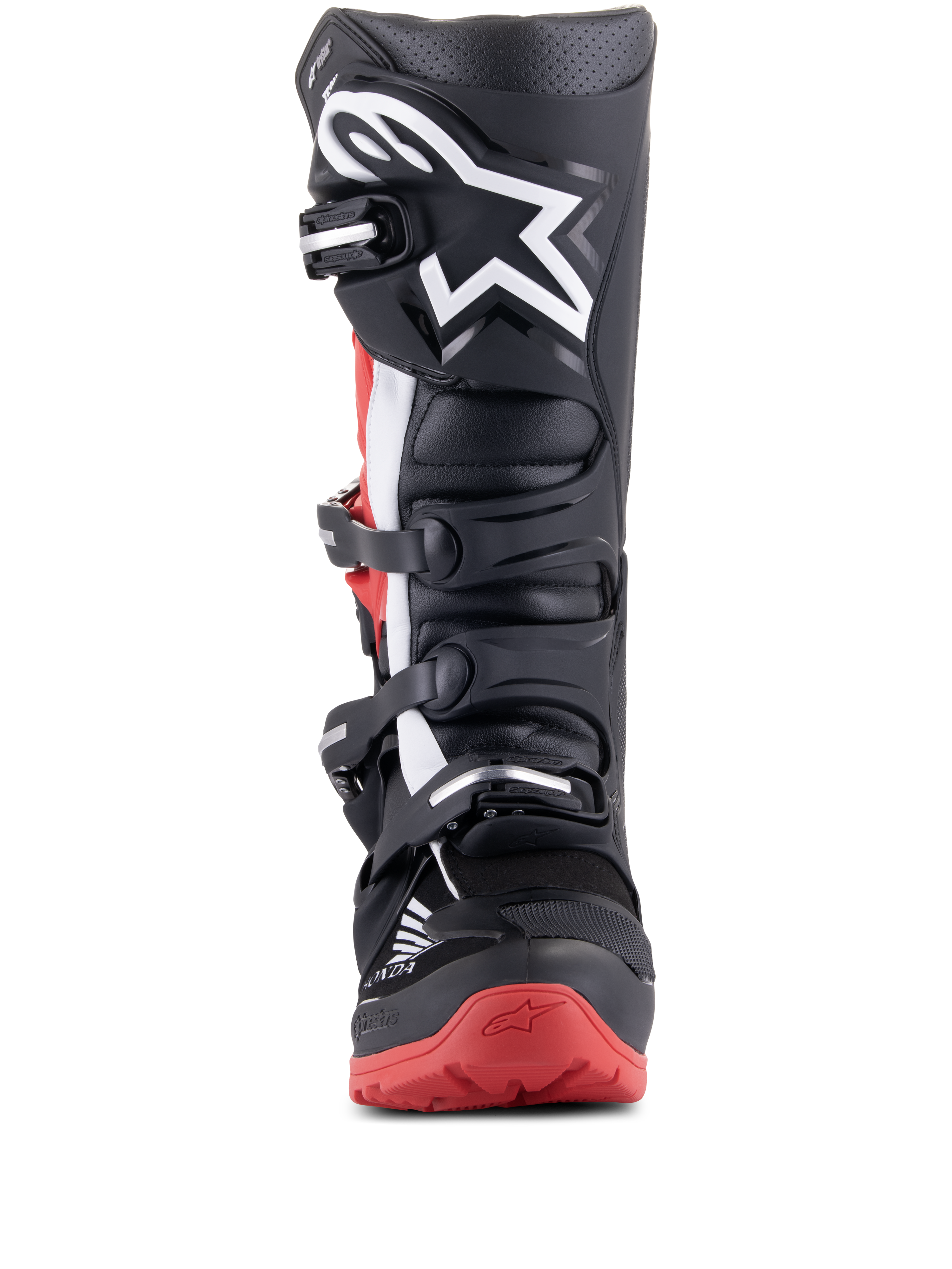 Botas Alpinestars Honda Tech 7 Enduro Drystar, negro y rojo brillante, vista frontal que muestra el sistema de cierre de múltiples hebillas, gran logotipo de estrella blanca en la espinilla y suela roja con la marca Honda, botas de moto impermeables para todoterreno