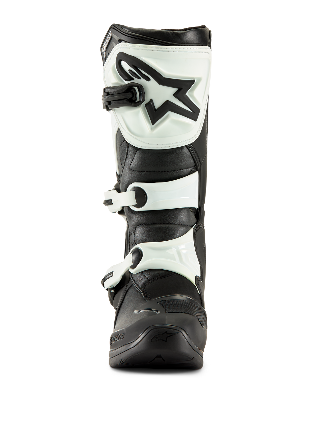 Botas Alpinestars Tech 3, botas de motocross, negro y blanco, vista frontal que muestra la placa de espinilla de TPU blanca con el logotipo de estrella negro y correas de hebilla blancas, calzado todoterreno duradero