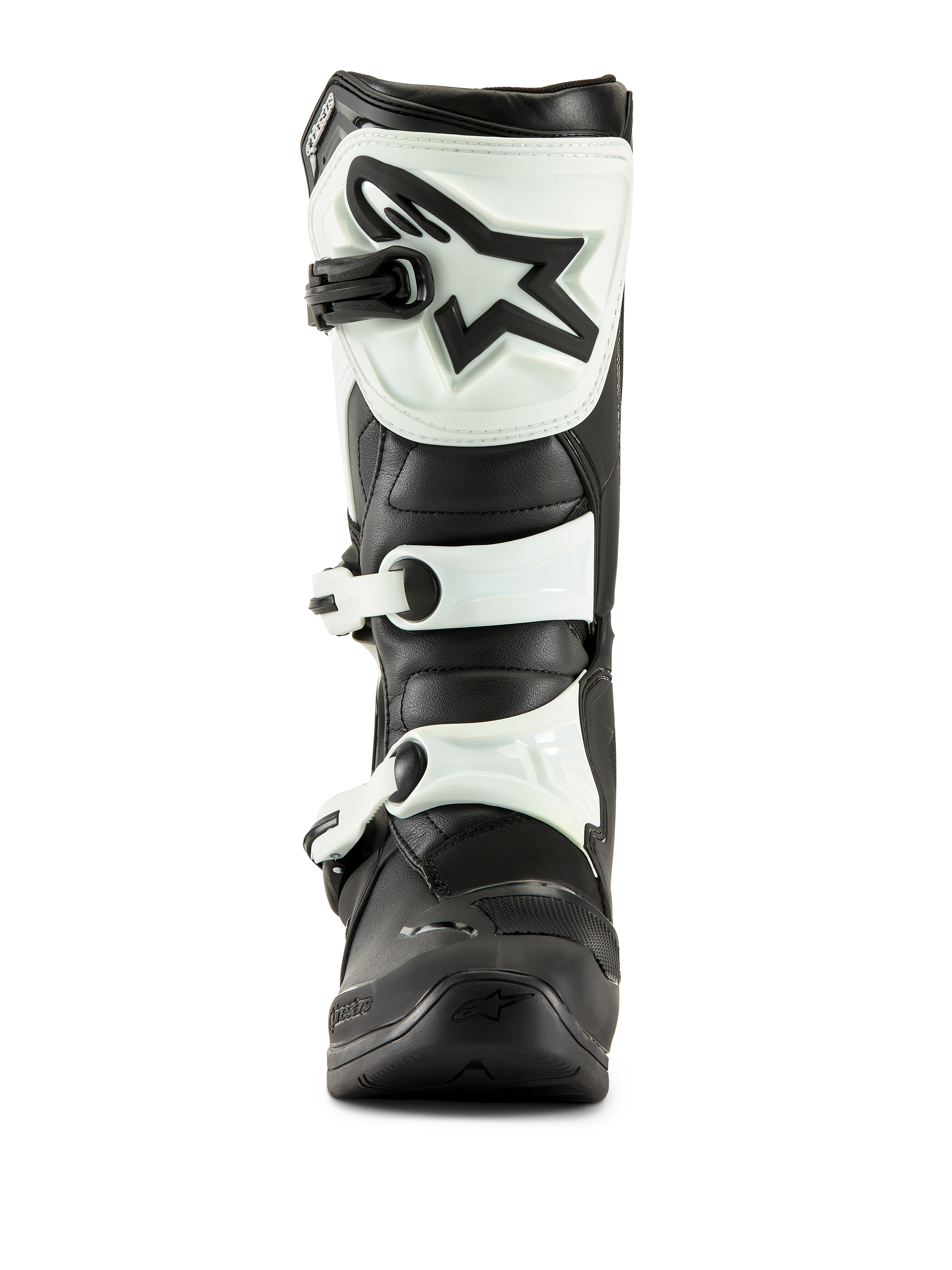 Botas Alpinestars Tech 3, botas de motocross, negro y blanco, vista frontal que muestra la placa de espinilla de TPU blanca con el logotipo de estrella negro y correas de hebilla blancas, calzado todoterreno duradero