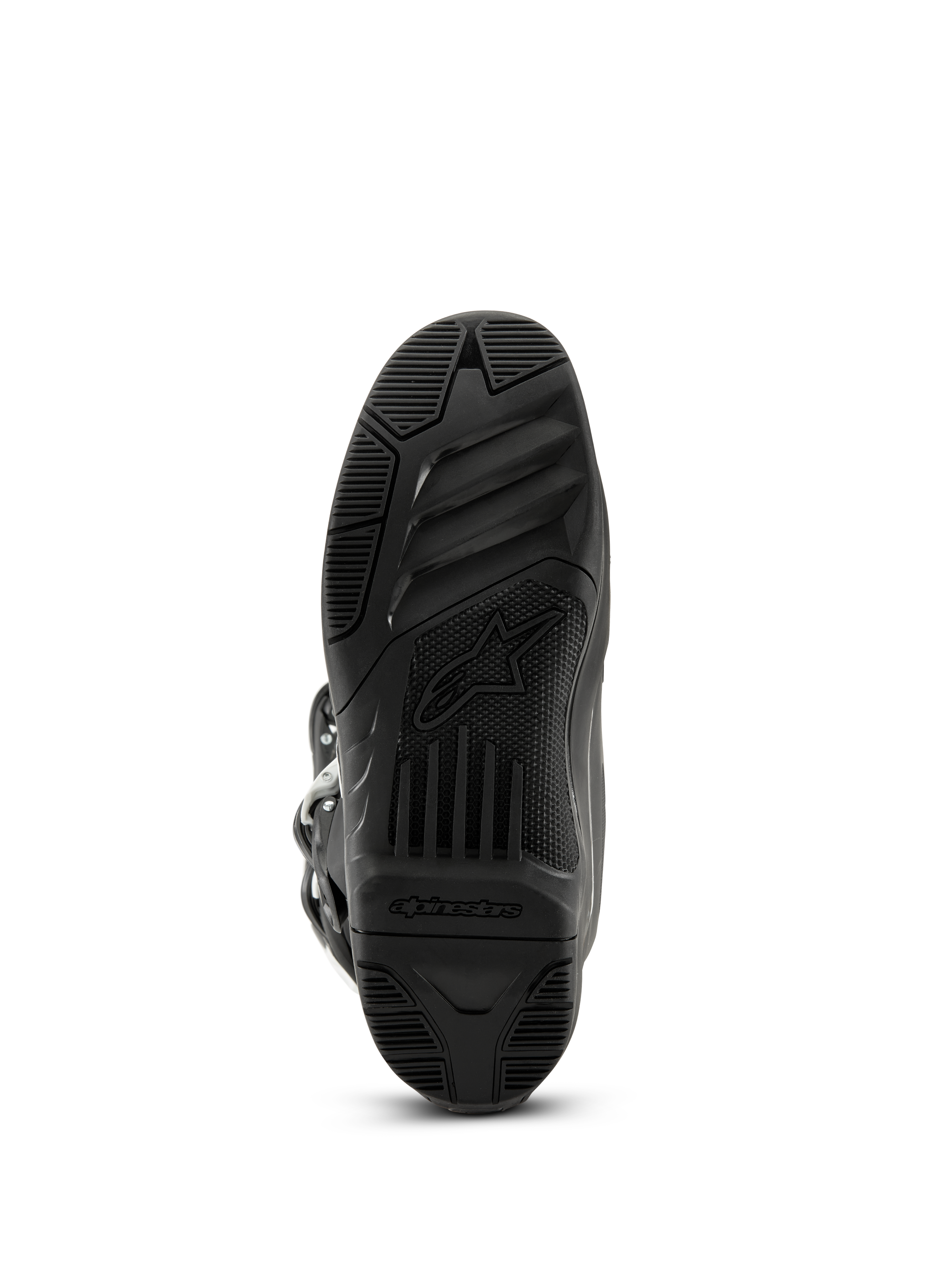 Botas Alpinestars Tech 3, botas de motocross, negras, vista inferior de la suela de goma texturizada con el logotipo y el nombre Alpinestars, diseño de banda de rodadura de alto agarre para rendimiento todoterreno