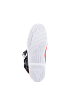 Alpinestars Tech 3, botas de motocross vistas desde la suela, con suela blanca de alto agarre, detalles rojos y hebillas negras