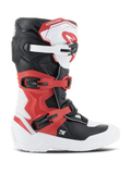 Botas Alpinestars Youth Tech 3S, botas de motocross, blanco, negro y rojo brillante, vista de perfil lateral, con un sistema de cierre de múltiples hebillas, placa de espinillera reforzada y suela blanca duradera, equipo de protección todoterreno para jóvenes