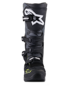 Alpinestars Tech 5, botas de motocross negras y gris frío con amarillo flúor, paneles de camuflaje y logo de estrella.