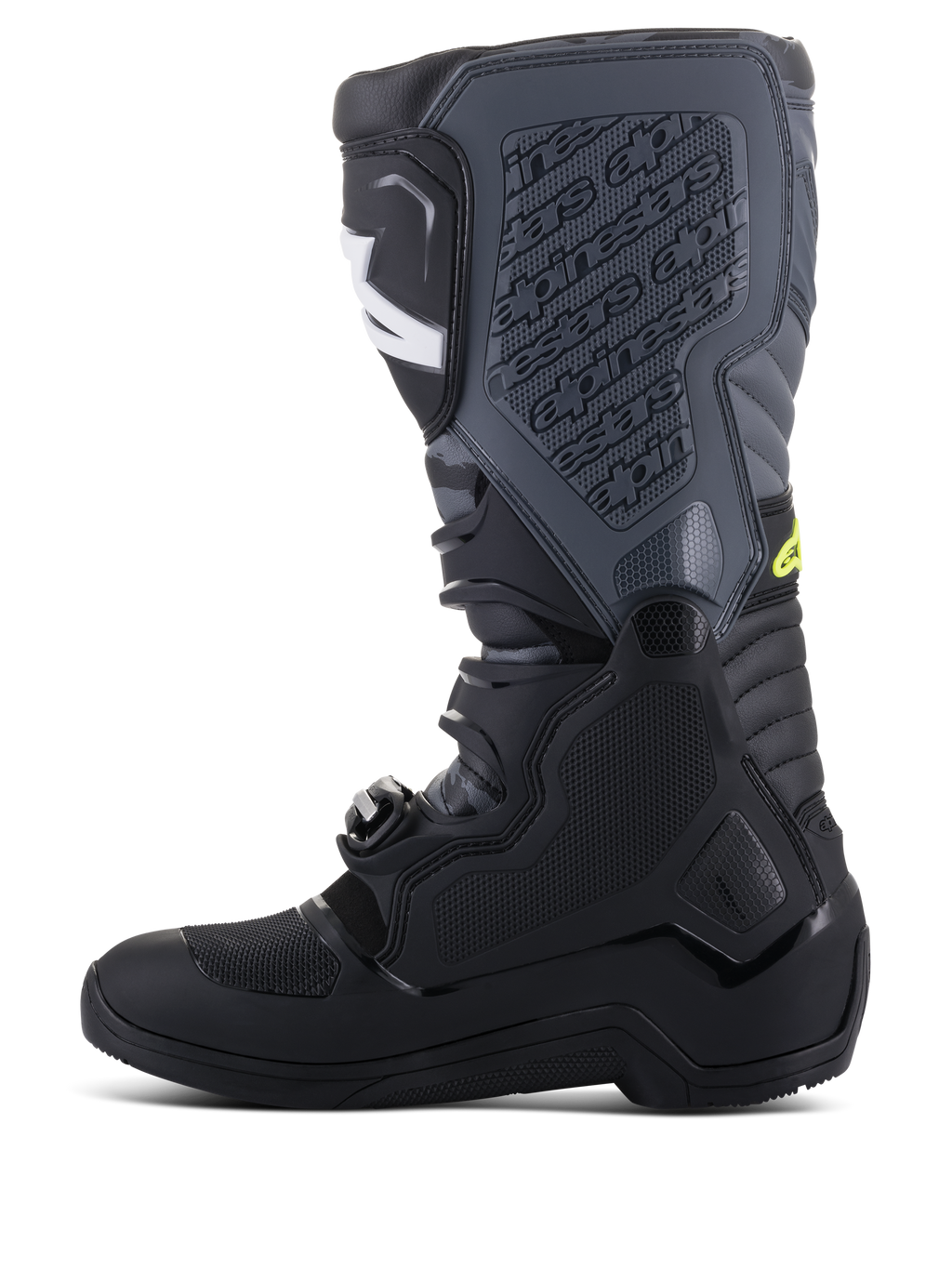 Botas Alpinestars Tech 5, botas de motocross, negras y gris frío con detalles en amarillo flúor, perfil lateral que muestra una construcción alta de múltiples paneles, sistema de cierre de hebillas y espinillera texturizada con marca en relieve, calzado de competición off-road