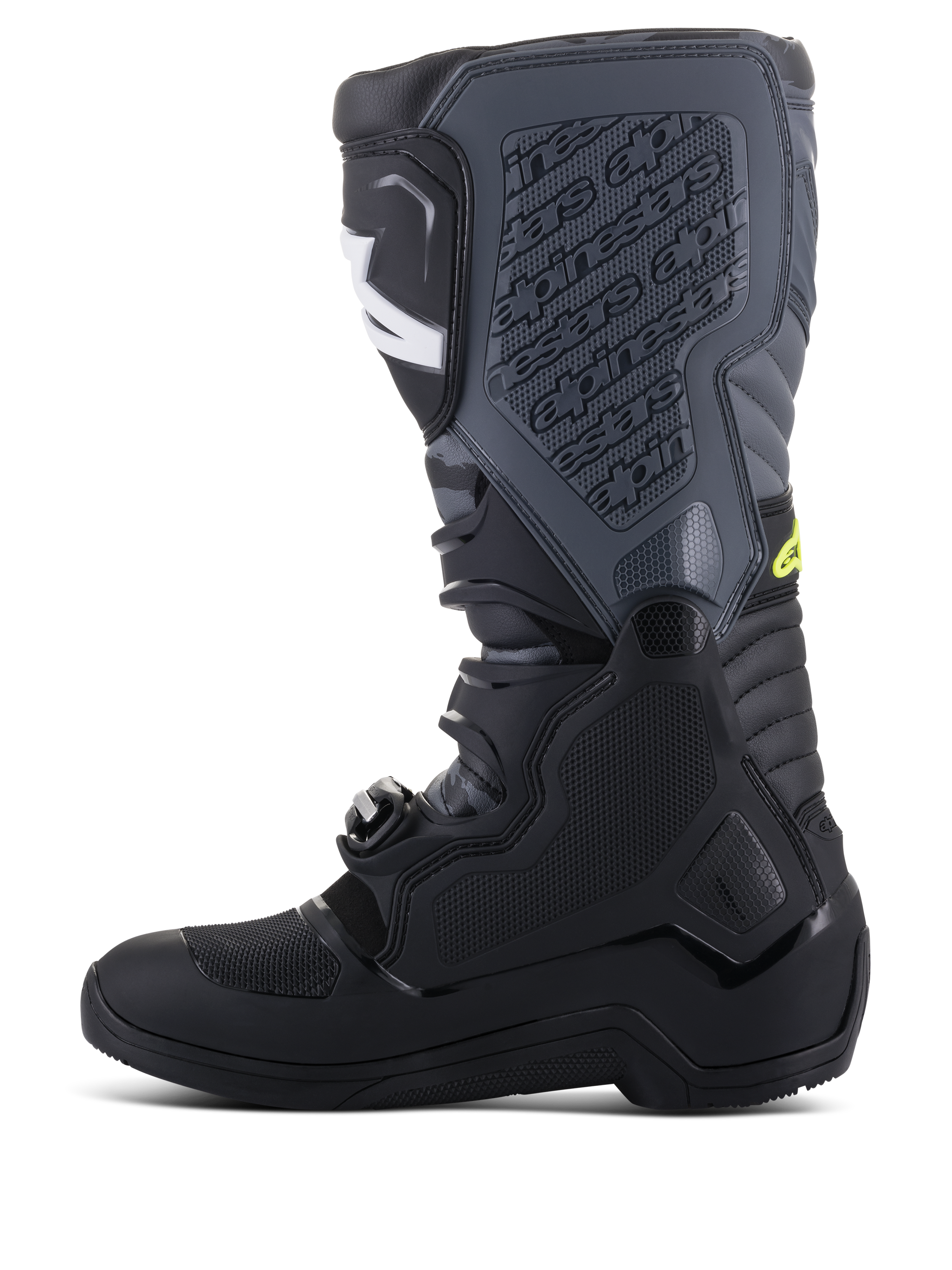 Botas Alpinestars Tech 5, botas de motocross, negras y gris frío con detalles en amarillo flúor, perfil lateral que muestra una construcción alta de múltiples paneles, sistema de cierre de hebillas y espinillera texturizada con marca en relieve, calzado de competición off-road