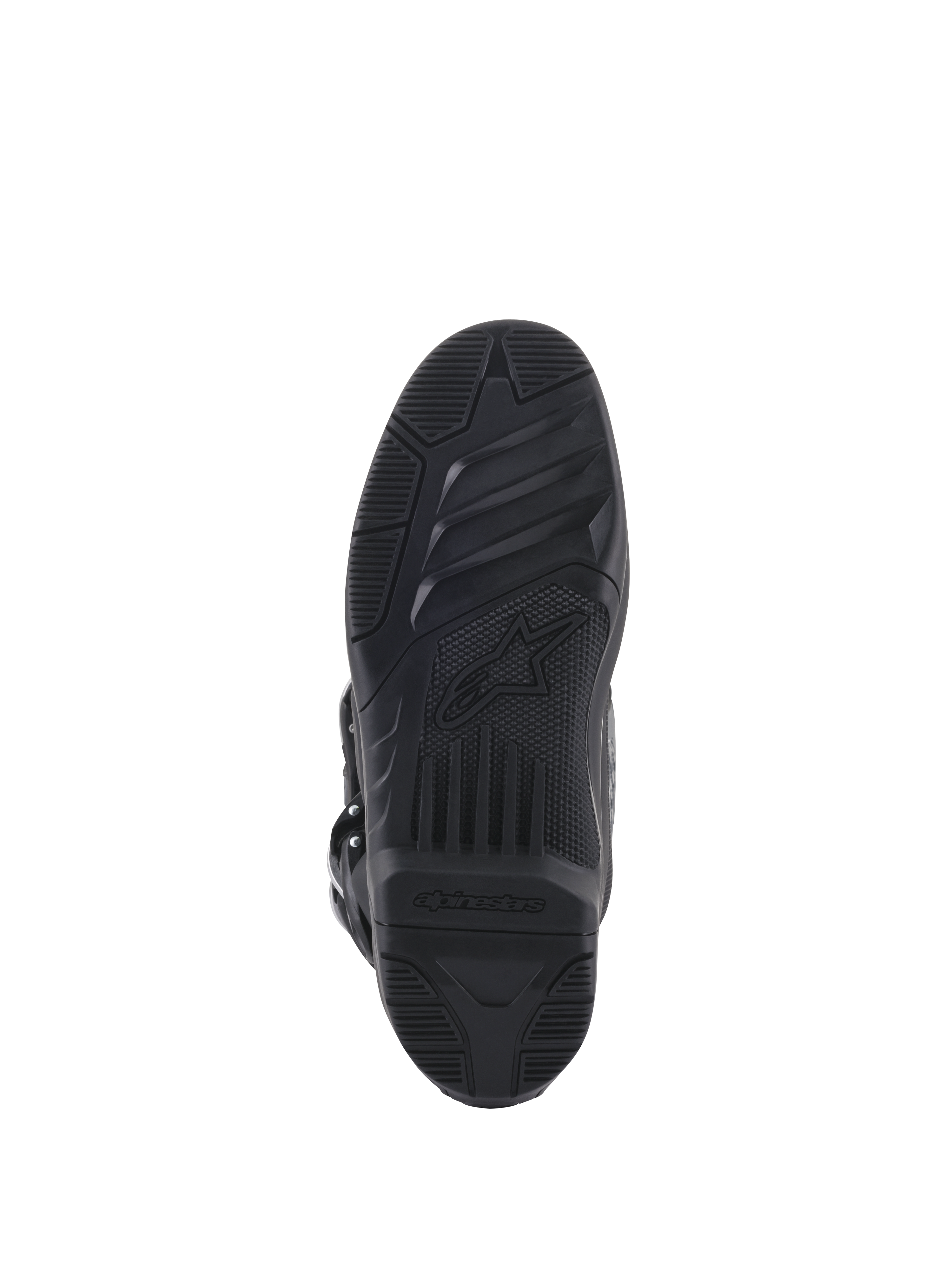Botas Alpinestars Tech 5, vista inferior de la suela, goma negra con patrones de agarre texturizados, con el logo de la estrella y marca Alpinestars, diseño duradero para tracción en motocross y off-road