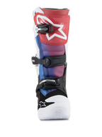 Alpinestars Youth Tech 7S Boots, Motocross Boots, White Black Rainbow, front view featuring a red shin plate with white star logo, blue and purple panels, black buckle system, and white toe, durable off-road racing footwear