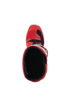Botas Alpinestars Youth Tech 7S, botas de motocross, rojas, vista superior que muestra el forro interior y la apertura, carcasa exterior roja con detalles en blanco y negro, diseñadas para pilotos junior de off-road