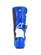 Botas Alpinestars Youth Tech 7 S, botas de motocross, azul, negro y blanco, vista trasera con logotipo de Alpinestars en blanco, carcasa de TPU azul con zonas de flexión tipo acordeón blancas, calzado protector para conducción off-road juvenil