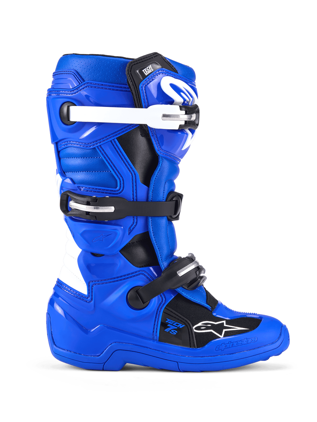 Botas Alpinestars Youth Tech 7 S, botas de motocross, azul, negro y blanco, vista lateral que muestra la parte superior de microfibra reforzada con PU, sistema de cierre de cuatro hebillas con correas blancas y negras, espinillera de TPU y logotipo de Alpinestars, calzado protector todoterreno para jóvenes pilotos