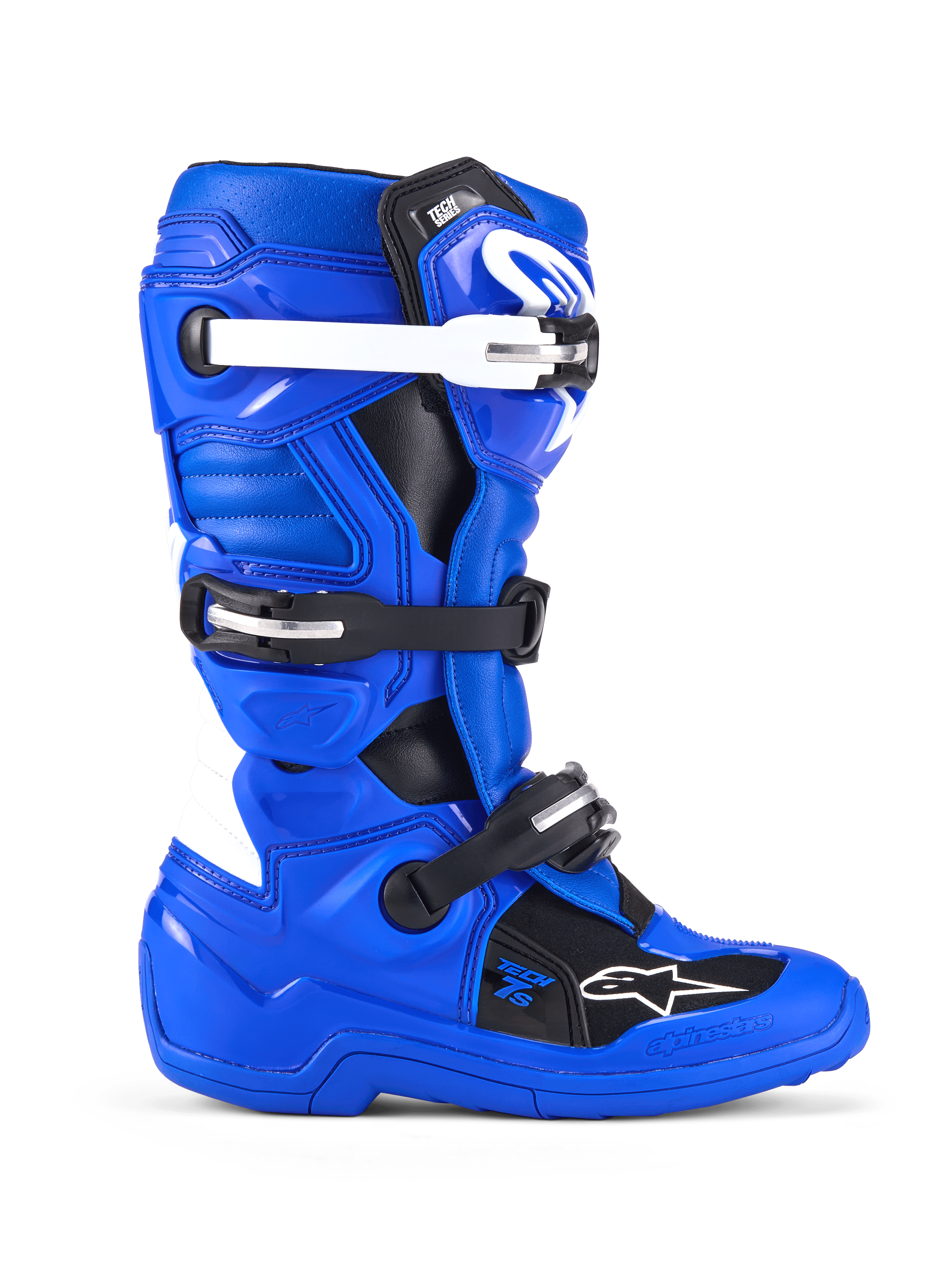 Botas Alpinestars Youth Tech 7 S, botas de motocross, azul, negro y blanco, vista lateral que muestra la parte superior de microfibra reforzada con PU, sistema de cierre de cuatro hebillas con correas blancas y negras, espinillera de TPU y logotipo de Alpinestars, calzado protector todoterreno para jóvenes pilotos