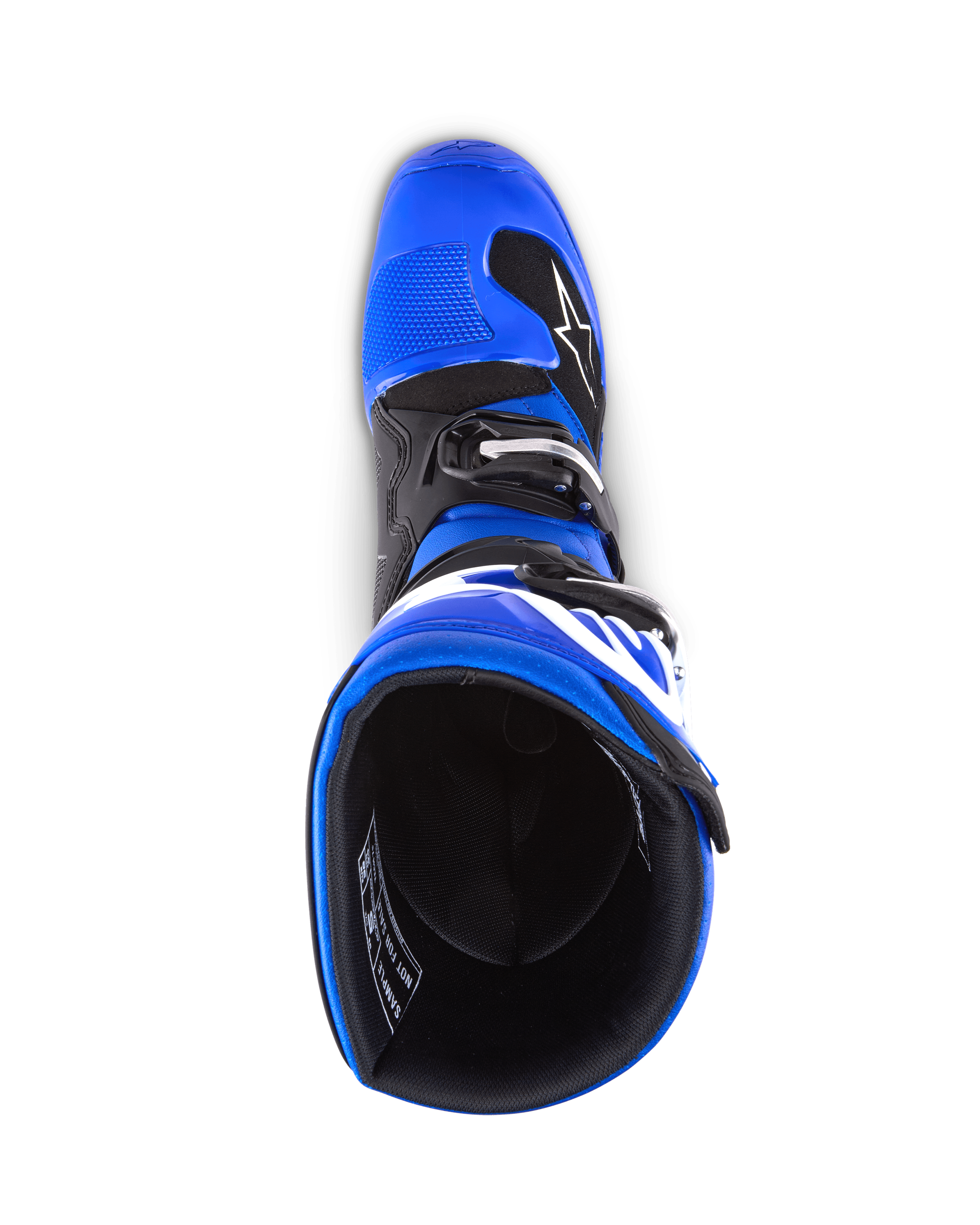 Botas Alpinestars Youth Tech 7 S, botas de motocross, azul, negro y blanco, vista superior mirando al interior de la bota, que muestra la carcasa exterior azul y el forro negro, construcción duradera con logotipos blancos para motocross juvenil