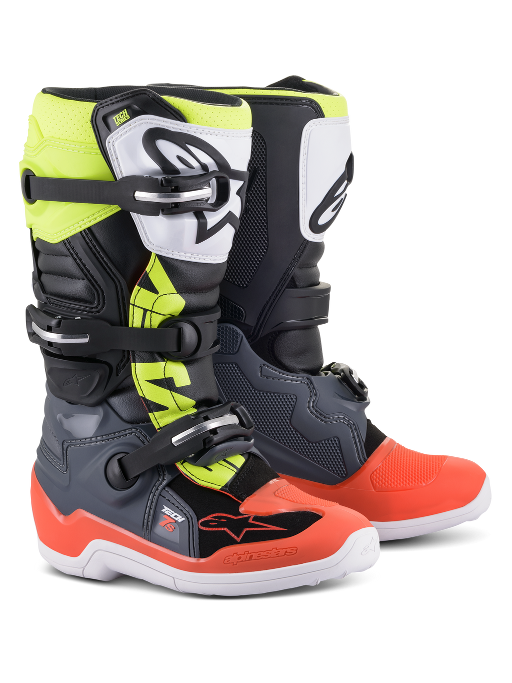 Botas Alpinestars Youth Tech 7S, botas de motocross, gris oscuro con detalles en rojo y amarillo fluorescente, con placa de espinilla de TPU blanca con logo negro, sistema de cierre de triple hebilla y suela blanca duradera, diseñadas para jóvenes pilotos de off-road.
